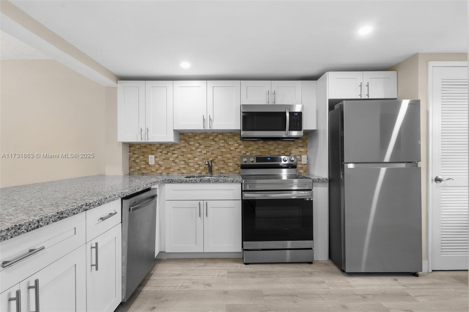 Updated 2 bed/2 bath Condo with Golf & Water views in a secured, well maintained building in convenient Palm Aire. Close proximity to shopping, library, and a wonderful community park w/ tennis, volleyball, pickleball plus access to 2 community pools, BBQs, exercise areas & other amenities, you'll have activities & social opportunities. Unit recently updated w/ luxury vinyl plank floors, SS kitchen, updated bathrooms. Impact Windows throughout; sliding Impact door to screened patio. Unit is in excellent condition for worry free living. Walk-in closet, ceiling fans, washer & dryer in unit, & assigned parking close to building entrance. New A/C 2024. Building requires 700 + credit renters insurance required. Non-Smoking, No Pets. Includes high speed internet (800mg) & HBO Max included.
