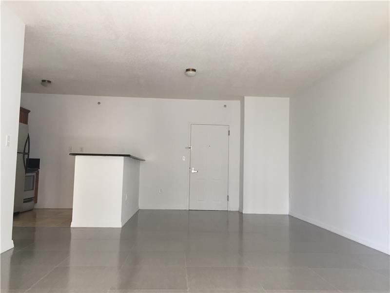 Large one bedroom, one bath unit available in Edgewater area of Miami. Spacious unit with tile flooring, stainless steel appliances, granite countertops, washer & dryer, large closets and huge balconies.  Building features include a fitness area, rooftop  sundeck and gated, covered parking.  Steps away from the bay, close to shopping, restaurants and entertainment.  Minutes away from Downtown, Miami Design District, and the beach.