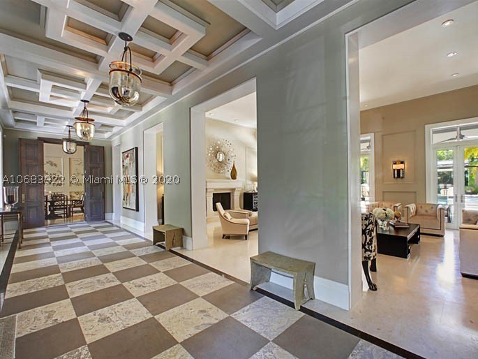 This stunning Pinecrest estate designed by Portuondo Perroti embodies timeless elegance combined w modern luxuries.Nestled on a tree lined 38,368 sf lot this home features 6 beds,8/1 baths.The Chef’s kitchen-an epicurean dream-includes Miele,SubZero & Wolf appliances,custom wood cabinets, granite counter tops &  marble backsplash. French doors, limestone & herringbone wood floors, French oak paneling adorn the bar/media room completed by a 1000 bottle wine cellar.Master suite boasts fireplace,his/hers closets w walnut built ins, bath w marble, onyx & jade baths counter tops plus infinity soaking tub.Lounge by the infinity pool w murano glass accents, porch for dining/entertaining & full outdoor kitchen.3 car garage,elevator,Crestron system & whole house generator complete this masterpiece.