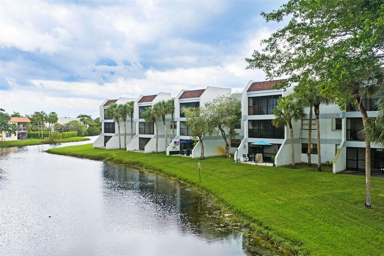 Stunning 1st-Floor Waterfront Corner Unit in Weston! Welcome to this meticulously maintained, sun-drenched 2BR/2BA ground-floor condo in the highly desirable Weston at Bonaventure. 
As a coveted corner unit, it offers unmatched privacy, extra storage, and an assigned parking space directly in front of the entrance. Premium porcelain tile flooring flows seamlessly onto screen cover porch and exit to a private patio, perfect for enjoying tranquil water views and sunsets..

Exclusive Access to the Elite 70,000 SQ FT Bonaventure Town Center Club and Enjoy premier, resort-style living with world-class amenities right at your fingertips:
• State-of-the-art Gym, Fitness Rooms, Spa, Sauna & Salon
• 2 Large Pools (1 Heated Olympic-Size) & Jacuzzi
• 4 Lit Tennis Courts & Indoor/Outdoor Pickleball
• 2 Full Indoor Basketball & 2 Indoor Racquetball Courts
• 4 Professional Bowling Lanes & Roller Skating Rink
• Billiards Room, Ping Pong, Foosball & Mini Golf
• BBQ/Picnic Areas, Tiki Huts, Tot Lot & Event Spaces

Unbeatable Location: Enjoy Weston’s world-renowned quality of life with top-tier A-rated schools, parks, and seamless access to I-75 and I-595.