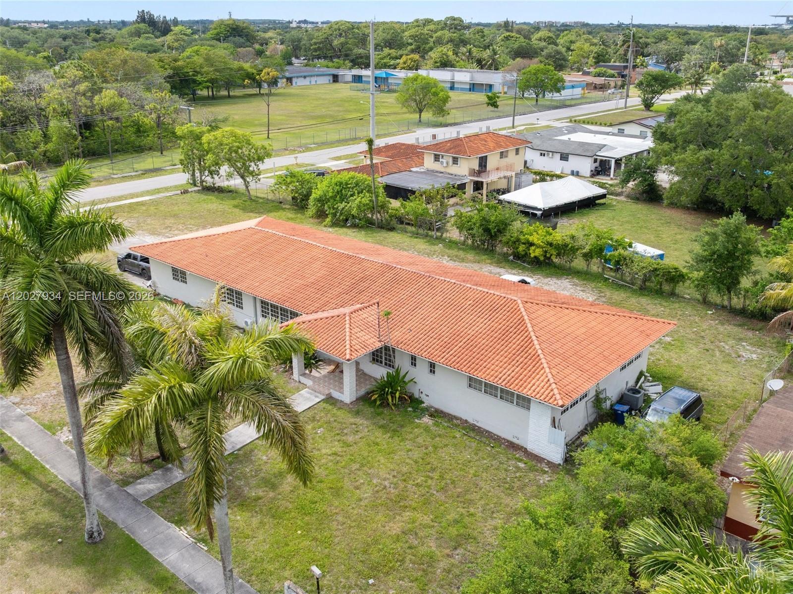 Welcome to this spacious Miami Gardens property situated on an oversized 0.69-acre lot, offering endless possibilities for outdoor living, entertaining, and future expansion. This well-maintained home features 3 bedrooms, 2 bathrooms, a functional layout, and a bright living area designed for comfortable everyday living. The large kitchen provides ample cabinet and counter space, while the expansive backyard creates a private retreat with room for a pool, recreational vehicles, boats, or additional amenities. Conveniently located near major highways, schools, shopping, dining, and entertainment, this property combines space, versatility, and accessibility in one of Miami Gardens' most desirable locations. A rare opportunity to own a large lot with exceptional potential.