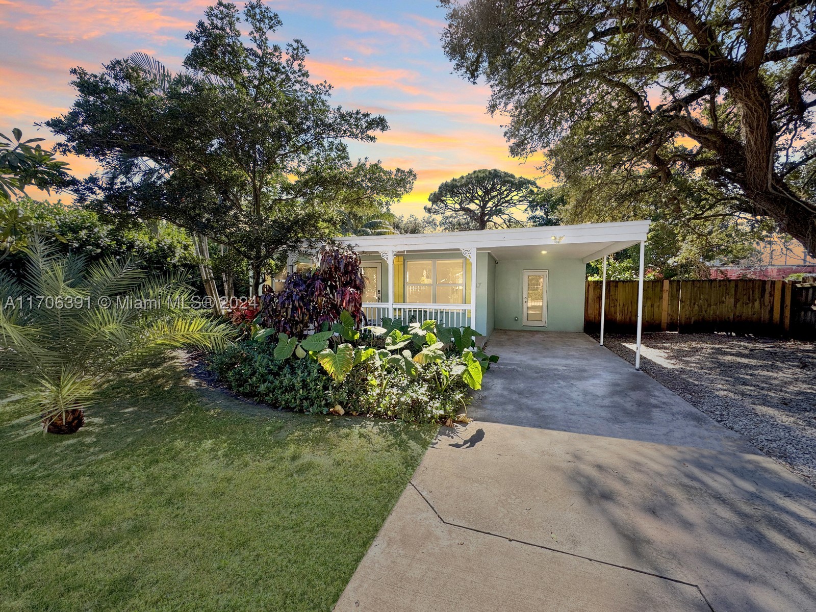 Check out this stunning, renovated 2/1 home in Fort Lauderdale! This beautiful property has full impact windows and doors for added peace of mind, a completely renovated interior with modern finishes, and a spacious porch where you can enjoy your morning coffee or evening sunsets. Relax on the deck or host in your very own private beach area in the yard—the perfect spot for entertaining or kicking back and enjoying the Florida weather. The outdoor living space offers many areas to hang out and enjoy, all with no HOA. The home also features a separate dining room, a fully equipped kitchen with everything you need, tropical foliage that brings the island vibes, a carport, a long driveway that provides ample parking, a laundry room, and a gated property for added privacy.