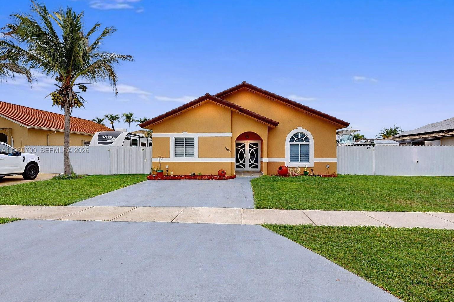 Welcome to this charming 4-bedroom, 2-bathroom home located in the heart of Homestead. This move-in ready residence features ceramic tile flooring throughout and a spacious layout designed for comfortable living. The bright living and dining areas are perfect for entertaining or enjoying family time. Step outside to your private backyard with a heated pool, ideal for relaxing and enjoying the South Florida lifestyle. Conveniently located near the Florida Turnpike, shopping centers, parks, and restaurants. No HOA!