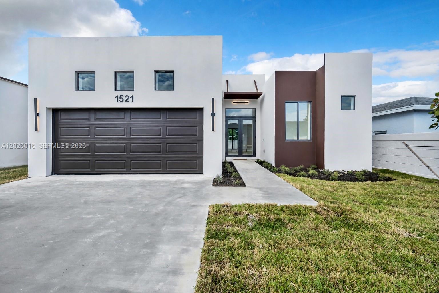 Discover an incredible opportunity to own a brand-new, high-quality single-family home in Fort Lauderdale. Currently under construction in the fast-growing Broadview Park neighborhood, this home offers a central location just minutes from major roads, downtown Fort Lauderdale, the beaches, and everyday conveniences.
Designed with strength, safety, and comfort in mind, this residence is built with state-of-the-art precast concrete and steel, a concrete roof, an extra-thick slab, and full high-impact windows and doors. Engineered to exceed the strictest hurricane codes, it offers peace of mind and extensive insurance savings. The thoughtful split floor plan provides 3 bedrooms, 3 full bathrooms, plus a versatile office/guest room that can adapt to your lifestyle.
Step into a bright, open living space created for entertaining and easy everyday living. Enjoy a modern designer kitchen with Samsung appliances, a striking quartz dual waterfall-edged center island, 11-foot ceilings, and energy-efficient LED lighting throughout. The primary suite feels like a private retreat with large separate closets and dual sinks for added comfort and convenience.
Additional highlights include a spacious 2-car garage, pre-wired for high-quality AV systems in every room to support today’s smart-home living, and a one-year builder-backed home warranty for extra confidence in your purchase. This home blends modern design, fortress-strong construction, and worry-free ownership.