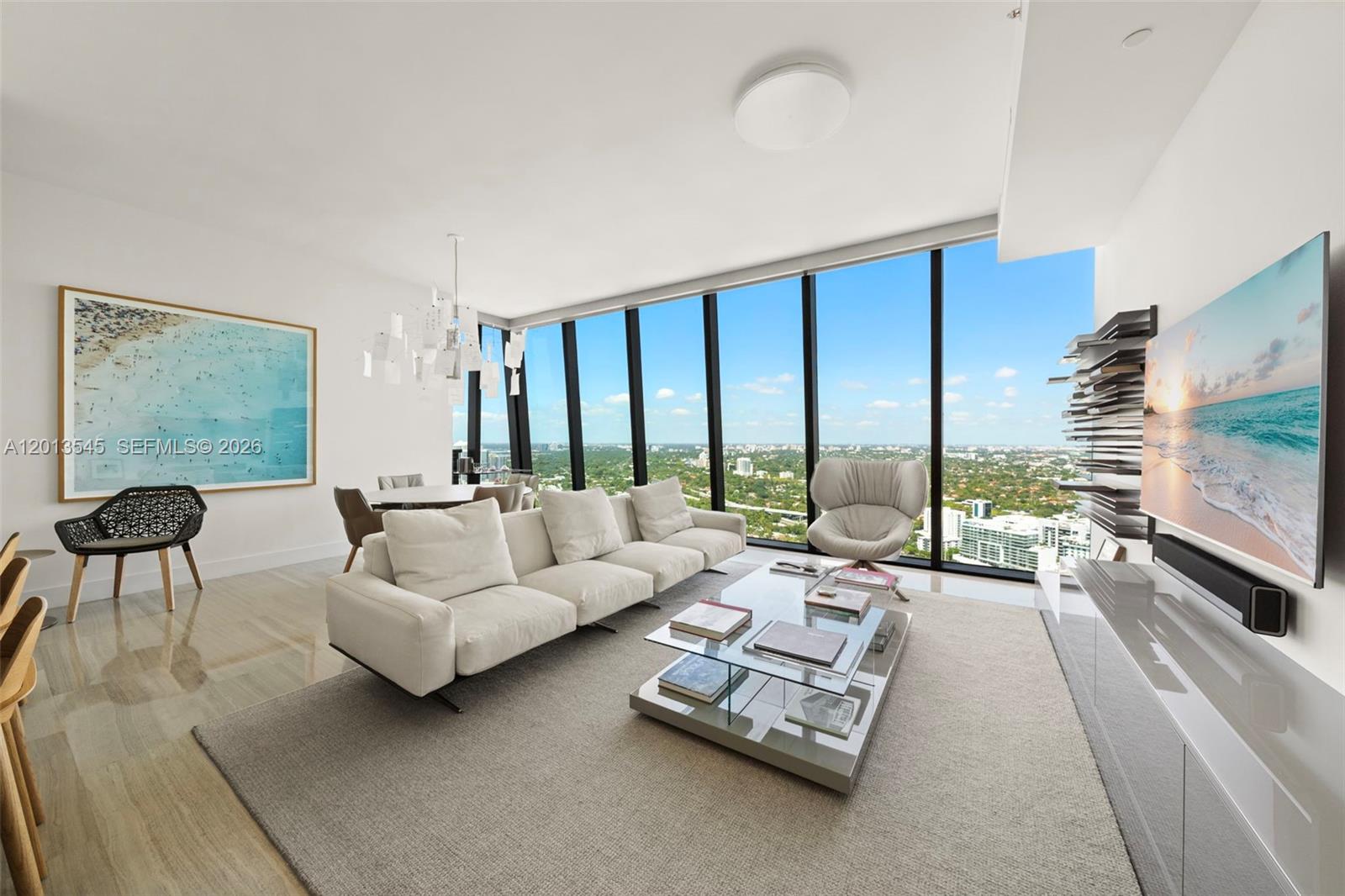 Experience luxury living in this CORNER residence 2-bedroom residence on the 41st floor at Echo Brickell featuring soaring 11-foot ceilings showcasing southwest-facing views of Biscayne Bay, the Miami skyline, and unforgettable sunsets through floor-to-ceiling windows. Marble flooring throughout, custom-built closets, and a seamless open layout designed for both everyday living and entertaining. The sleek chef’s kitchen is equipped with Italkraft cabinetry, Sub-Zero and Wolf appliances, and fully integrated Apple-based smart home technology controlling lighting, audio, and shades. A spacious private terrace with a built-in summer kitchen creates the perfect indoor-outdoor living experience. Designed by renowned architect Carlos Ott, Echo Brickell is Miami’s premier boutique luxury building with only 172 residences, offering an unmatched privacy and exclusivity in the heart of Brickell. Residents enjoy resort-style amenities including an infinity-edge pool with food and beverage service, state-of-the-art fitness center, spa deck with panoramic views, 24-hour concierge, valet, security, and robotic parking technology (2 spaces). Perfectly positioned on the quieter east side of Brickell Avenue, yet moments from Miami’s best dining, shopping, nightlife, and entertainment, this residence offers the ultimate blend of luxury, privacy, and walkability. Can be purchased furnished - inquire about pricing.