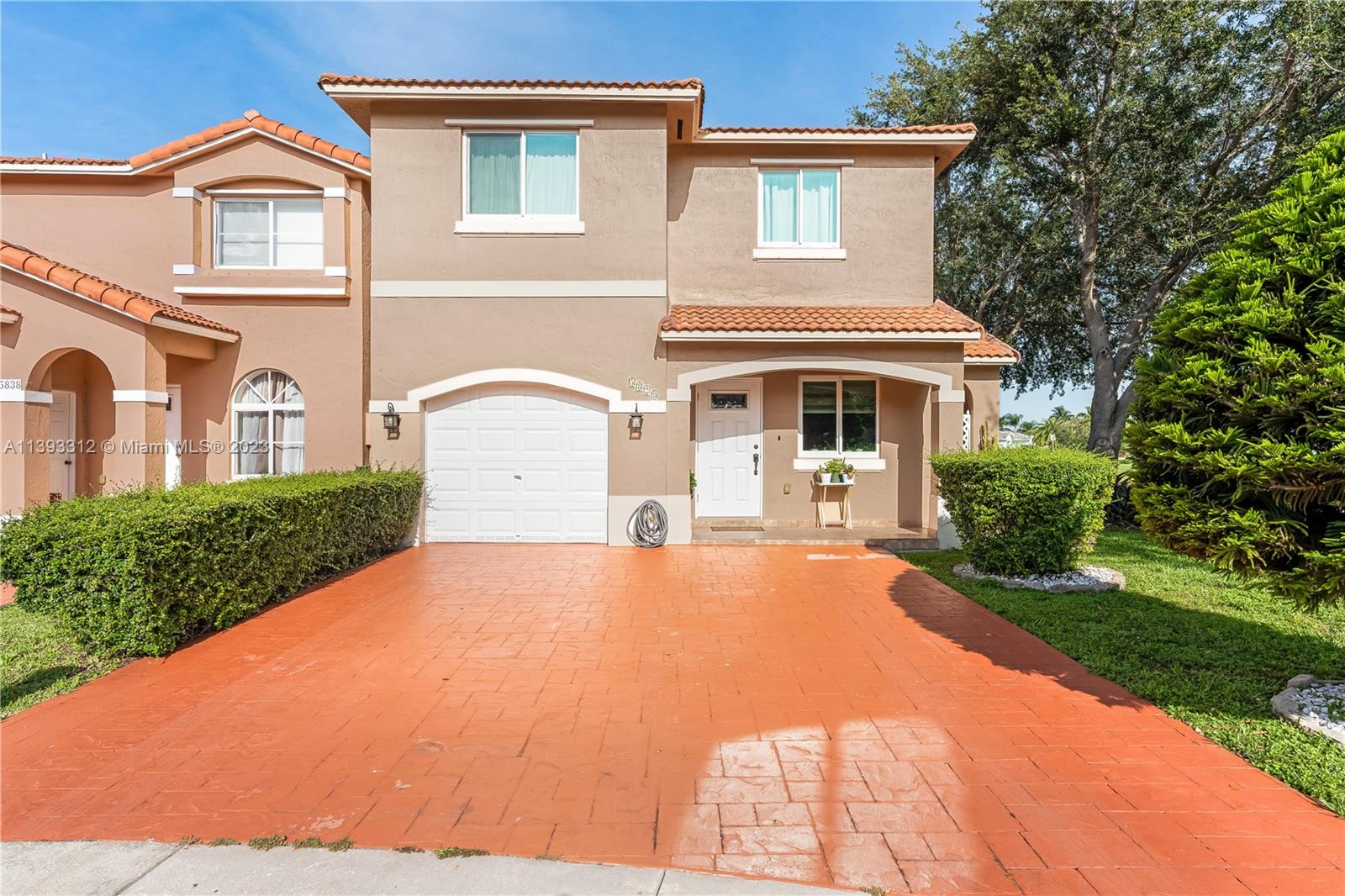 Welcome to this beautiful corner lot townhouse, perfectly situated with a picturesque lake in the back, offering breathtaking views and tranquility. Spanning across a generous 1,759 s/f lot, this property boasts a convenient 1-car garage, ensuring ample space for parking and storage. Inside, you'll discover a spacious and well-designed floor plan, featuring 4 bedrooms and 3 bathrooms in a total of 1,996 s/f. The home is adorned with impact windows throughout, providing both security and energy efficiency. Nestled in a fantastic neighborhood, this residence is surrounded by excellent schools, shopping centers, and hospitals, making it an ideal location for families and professionals alike.