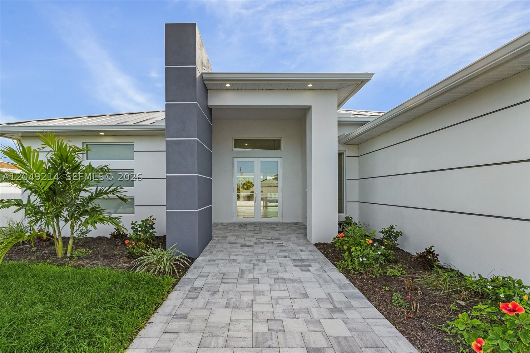Experience the ultimate Southwest Florida lifestyle in this stunning brand-new 2025 waterfront residence! Perfectly positioned on an Gulf Access canal, this exceptional home offers 2,350 SF of beautifully designed living space featuring an open-concept layout, contemporary finishes, and a spacious 3-car garage. Step outside to your private resort-style pool overlooking the water, complete with a seawall and boating access, making it a true paradise for boating enthusiasts. Situated on a generous 10,018 SF lot with desirable southern exposure, this home is ideal as a primary residence, vacation retreat, or investment opportunity. Enjoy luxury waterfront living at its finest