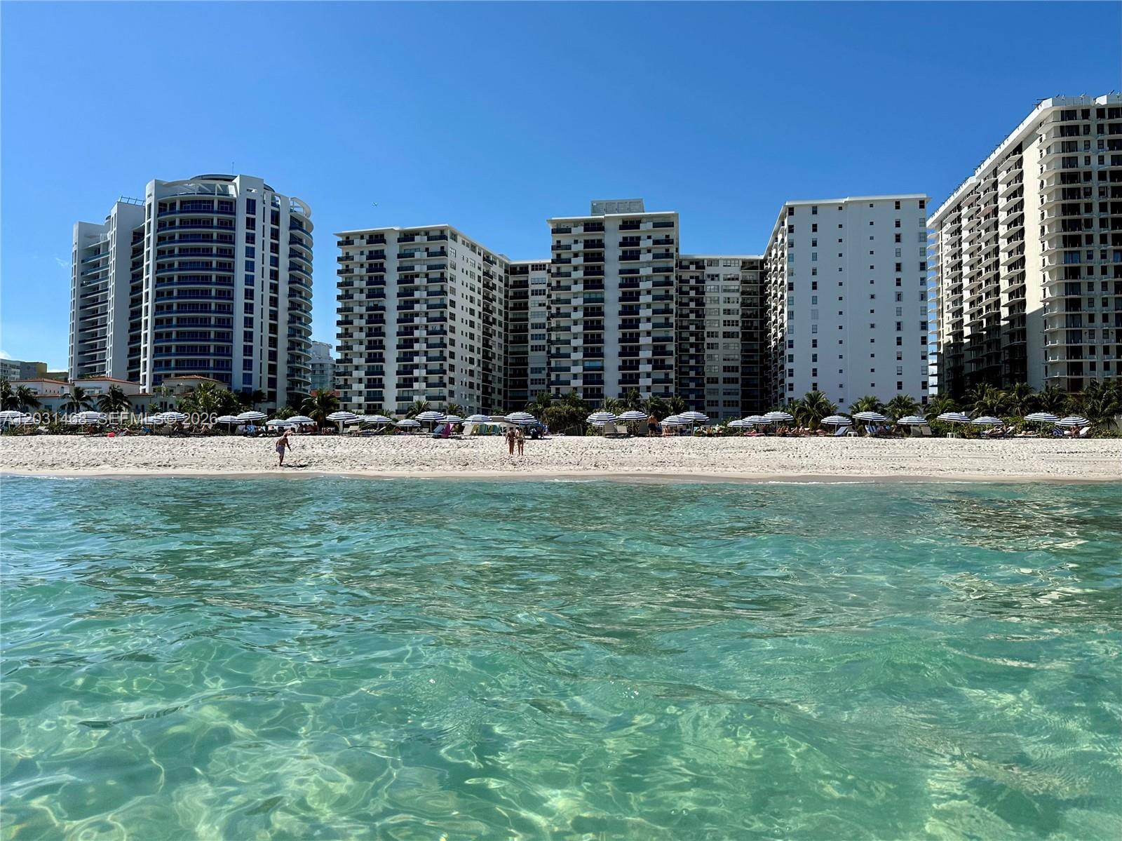 Your new fabulous beach life awaits! Take advantage of this amazing opportunity to live in a highly desirable, full-service building right on the beach and the iconic Boardwalk. This bright and airy apartment features shiny white ceramic floors for a clean, modern look and is flooded with natural light, thanks to additional windows in both the kitchen, bathroom, and guest bedroom. Huge balcony!
The unit comes fully equipped with updated bathrooms, an in-unit washer/dryer, and incredible storage solutions, including spacious walk-in closets and an extra private storage locker outside the apartment. Building Amenities & Features: Convenience: 2 laundry rooms on every floor, plus on-site management and maintenance. Wellness & Fun: Fully equipped gym, sauna, playground, and 5 dedicated BBQ areas. Essentials: On-site grocery store for ultimate convenience. Note: The building is currently enhancing its value with fresh exterior paint, and the pool is undergoing repairs. Prime Location: Perfectly situated within walking distance of local shops and restaurants. Enjoy the ultimate South Florida lifestyle being just 15 minutes away from South Beach, Bal Harbour, and Miami International Airport (MIA).Tenant occupied. Easy to show, but requires a 24-hour advance notice. Please call the listing agent directly to schedule all showings.