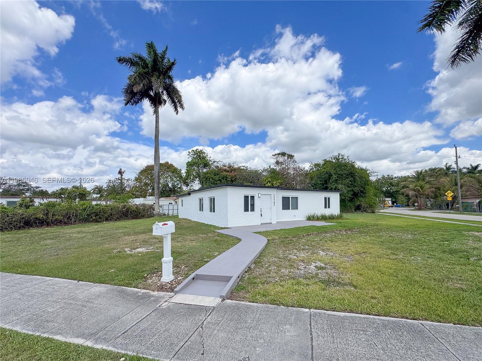 Beautifully renovated single-family home featuring 4 bedrooms, 2 bathrooms, and a versatile den, situated on a spacious 10,700 sq. ft. lot. Recent upgrades include a brand-new roof, high-impact windows, hurricane-rated doors, a modern kitchen, stylishly updated bathrooms, and new flooring throughout. Nestled in a wonderful family-friendly neighborhood, this home offers both comfort and peace of mind.