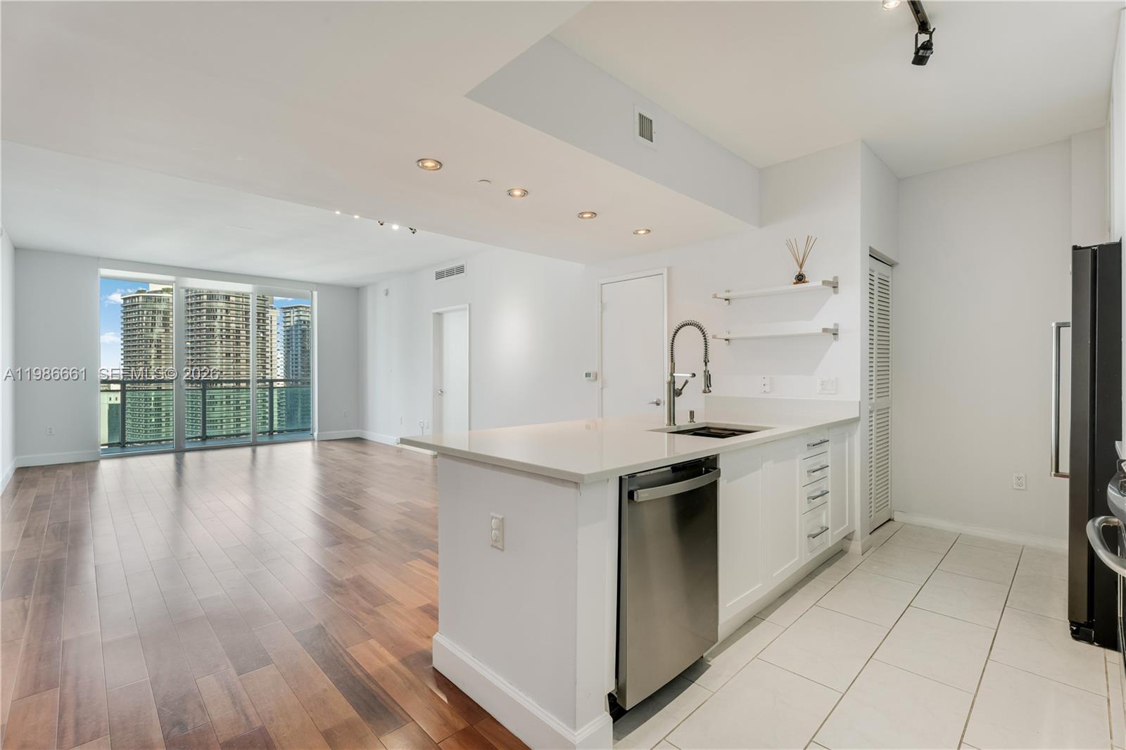 Experience luxury high-rise living in this stunning 2BR/2BA residence at The Plaza at Brickell, showcasing dramatic city skyline views from every room. Perfectly positioned in the epicenter of Brickell, you’re only moments from Brickell City Centre, Mary Brickell Village, dining, shopping, and endless entertainment. This bright and stylish home will be freshly painted before move-in and features a newly renovated modern kitchen, elegant wood flooring, an open-concept layout, split bedrooms for ideal privacy, full-size washer/dryer, and an expansive balcony offering the perfect backdrop for morning coffee or evening cocktails. One assigned parking space included. Residents enjoy world-class amenities: an impressive one-acre pool deck with two infinity-edge pools, private cabanas, a cutting-edge fitness center, business facilities, movie theater, social lounge, 24-hour security, and valet services. Step outside and walk to work, parks, restaurants, and everything the Brickell lifestyle has to offer!