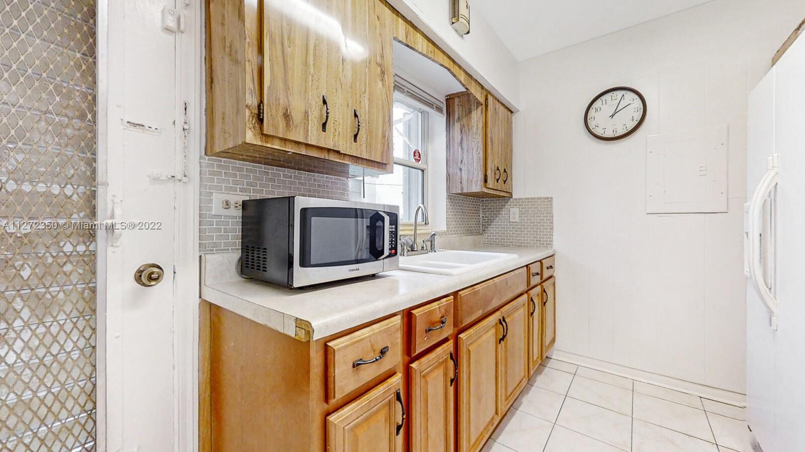 Appreciation, proximity to everything & trendy vibe offered by duplex (with an extra space for in laws) on a large fenced corner lot: one recently rented; one rented to an excellent tenant. You will LOVE cozy front porch; the back & side patios + covered areas; plenty of natural light; 2 separate washer/dryer rooms; ample & secure parking; tons of storage space + 2 sheds; many updates include: plumbing & electrical; fresh paint; new bathrooms; newer central ACs in units; & more. Great tenants & even better potential. No flood insurance! Centrally located; quiet & trendy community; next to Moorningside Elementary; near Design District, Wynwood; downtown; I-95, Biscayne Blvd, parks, farmers market; restaurants, shops, coffee, public transport; & mins to beaches.
