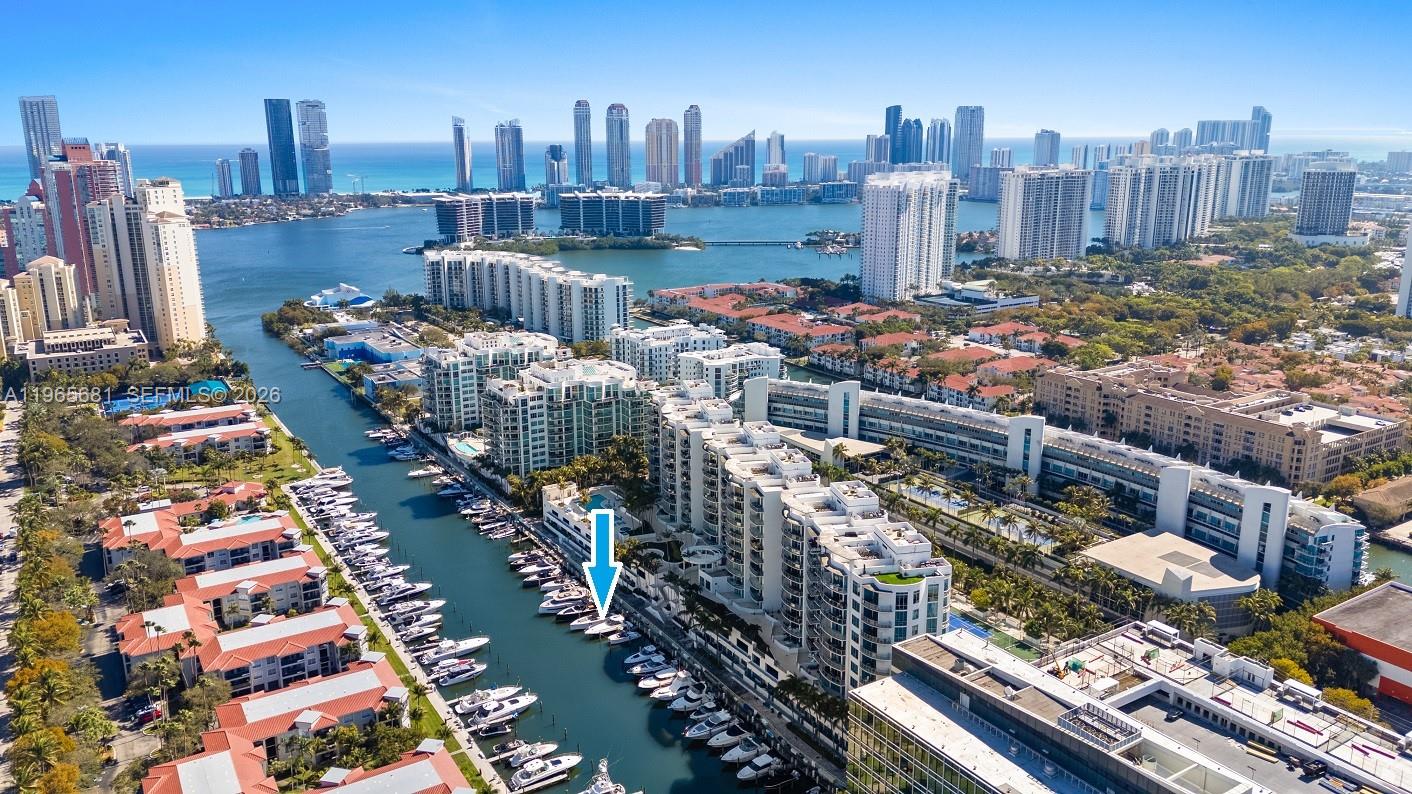 Rare to find. 50-Foot Marina Slip with 19' Beam and no bridges to Bay or Intracoastal, in a no-wake zone and private community. Minutes to Haulover Inlet and Sandbar and the open Ocean. Water included and Electrical is metered but no Monthly Maintenance fees for Marina Slip and no annual property taxes. Must own a condo in the building, Uptown Marina Lofts, 3029 NE 188th Street, Aventura, 33180. We currently have a loft 1 Bedroom + Den, 2 Full Baths for sale at $390,000. Call for showings and more details.
