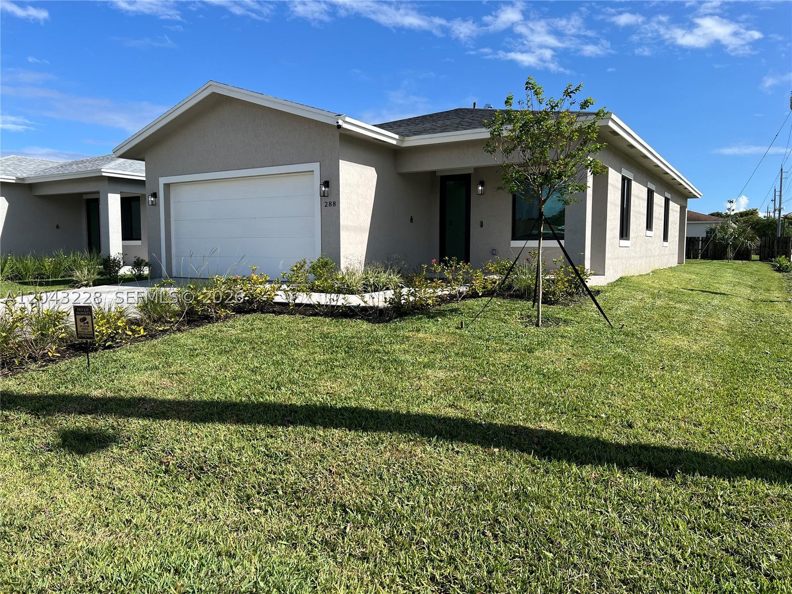 Brand-new construction on a premium corner lot offering modern design, exceptional craftsmanship, and an unbeatable Deerfield Beach location. This beautifully designed residence features a bright open floor plan filled with natural light, soaring ceilings, impact windows and doors, and high-quality finishes throughout. The spacious living and dining areas flow seamlessly into a contemporary kitchen, creating the perfect space for everyday living and effortless entertaining. Generously sized bedrooms provide comfort and privacy, while the luxurious primary suite offers a peaceful retreat with a spa-inspired bath and walk-in closet. The oversized corner lot enhances curb appeal while providing additional outdoor space and privacy. Complete with a two-car garage, energy-efficient construction, and professionally landscaped grounds, this home is designed for modern Florida living. Ideally located just minutes from beaches, parks, golf courses, shopping, restaurants, and major highways, this exceptional property combines the quality of new construction with the convenience of South Florida living. ENJOY A HEATED SALTWATER POOL, BEAUTIFUL TRAVERTINE POOL DECK, AND A SPACIOUS PRIVATE BACKYARD DESIGNED FOR YEAR-ROUND OUTDOOR LIVING AND ENTERTAINING. MOVE-IN READY BY THE END OF JULY.