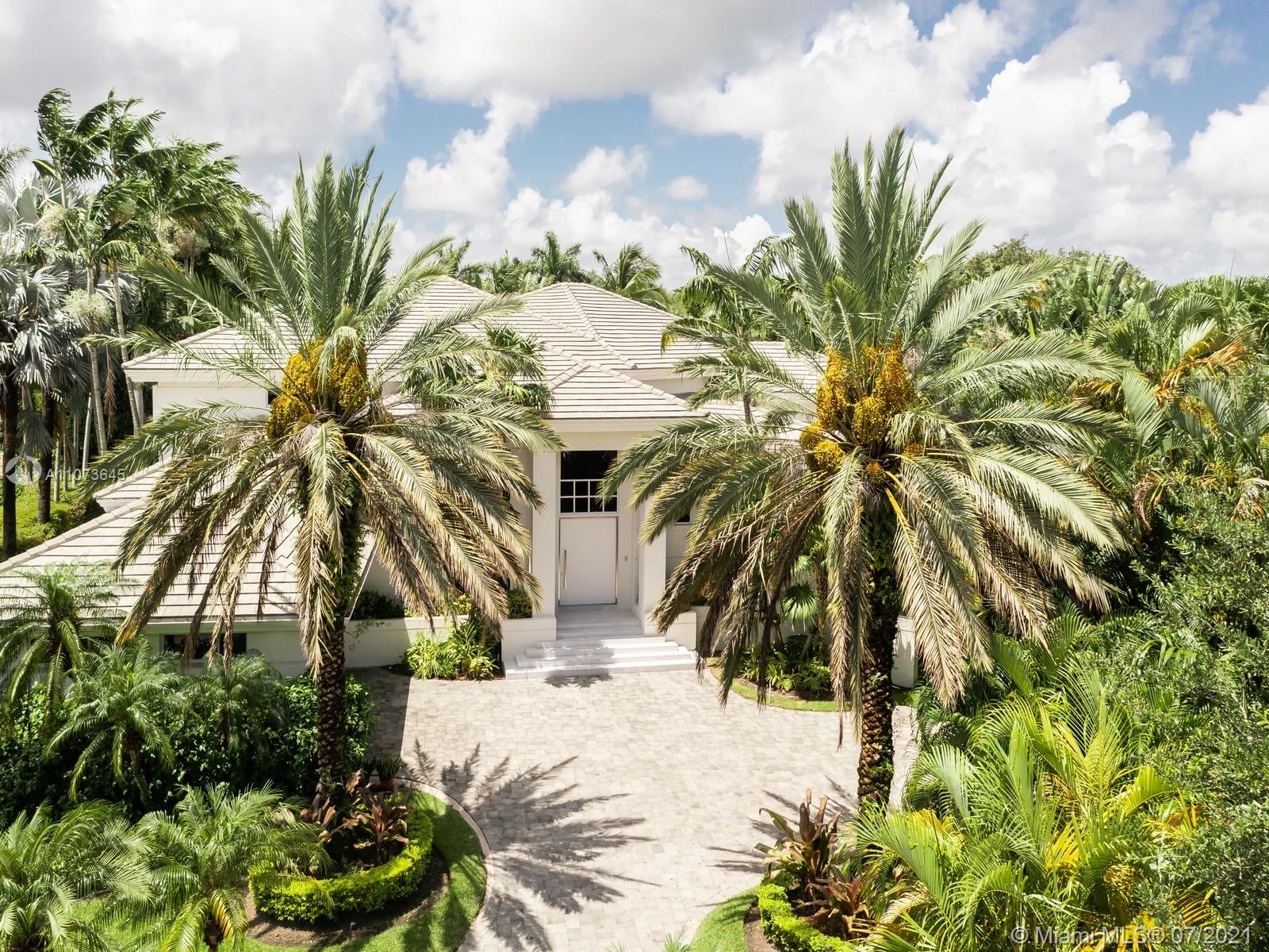 Move in ready to this gorgeous home in guard gated Cocoplum. This designer two story home sits on a oversized 24k lot nestled in a quiet cul de sac of only six homes. Remodeled to perfection with no expenses spared this 6,637.53 sqft (as per floor plans) home features an open floor plan with lots of natural light, vaulted ceilings and very generous spaces. Exquisite craftsmanship with luxurious designer finishes. Generously sized Italian Kitchen with top of the line appliances and family sized island with breakfast/dinning table. French doors throughout open to covered terrace, pool, gazebo, basketball court and much more! Must see!