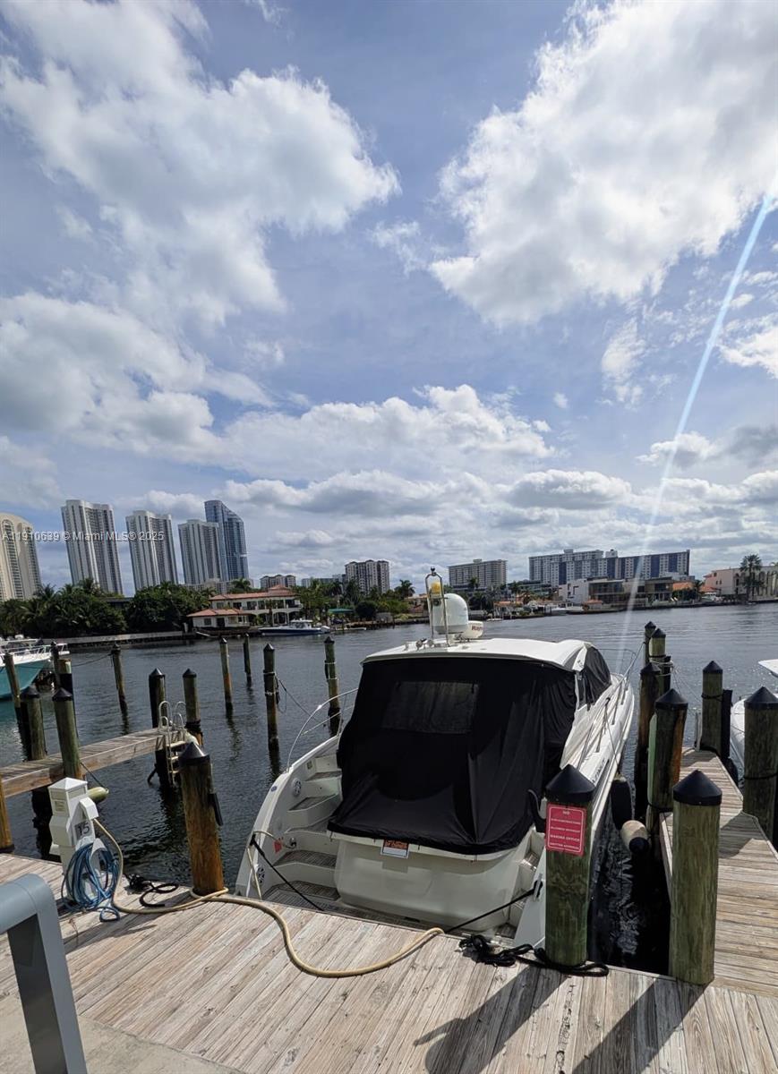 Elevate your boating experience! Secure a rare deeded 42 ft wet slip (UL-15} at the exclusive 400 Sunny Isles Marina. This premier slip is angled to allow for near straight-in access. It accommodates vessels up to 50 ft (42'L x 15.7'W), offering immediate, no-fixed-bridge access to the Intracoastal Waterway and Ocean.