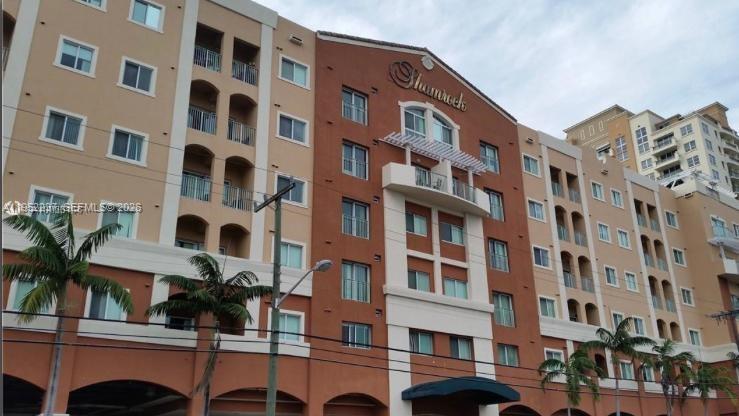 Centrally located 6th floor (PH) 2bed/2bath condo in Miami/Coral Gables. Unit offers spacious split floor plan, spectacular nighttime views of Coral Gables from open private balcony, in-unit washer/dryer with comfortable laundry closet w/storage, furnished and tile floors/carpeted bedrooms. 1 assigned covered parking space in a secured garage located steps from lobby. Truly the best parking ever. Pet Friendly. Shamrock at the Gables, built in 2004 offers double secured building entrance, dependable maintenance staff and monthly rentals allowed. Short drive to MIA, Brickell, Downtown Miami, Coconut Grove, 836, I-95, University of Miami, & Hospitals. Pedestrian friendly Coral Way- walk to restaurants, shopping, Coral Gables hot spots, and Shenandoah Park with pool. No Amenities in building.