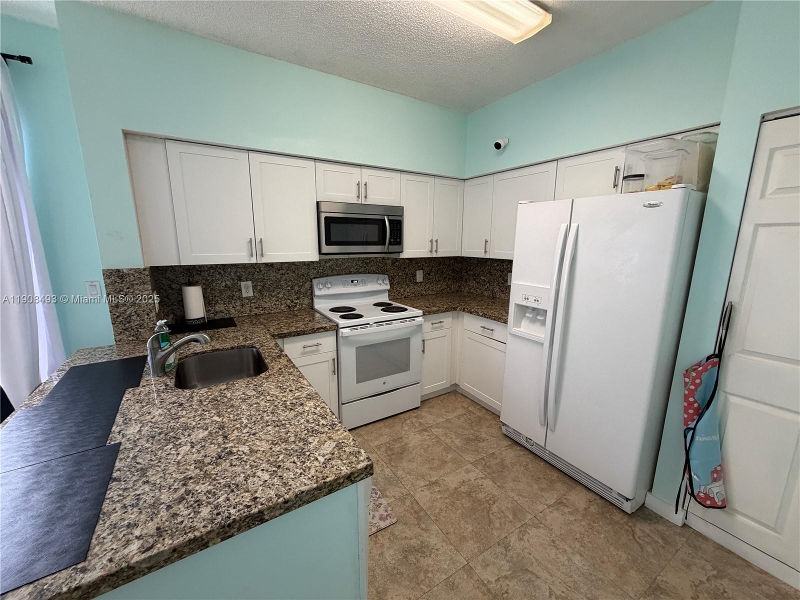 SIERRA RIDGE CONDO H - Residential