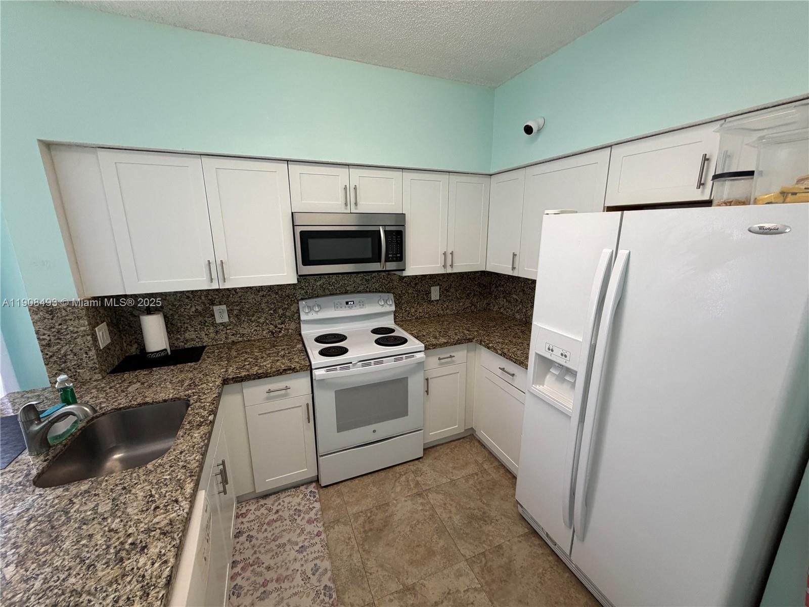 SIERRA RIDGE CONDO H - Residential