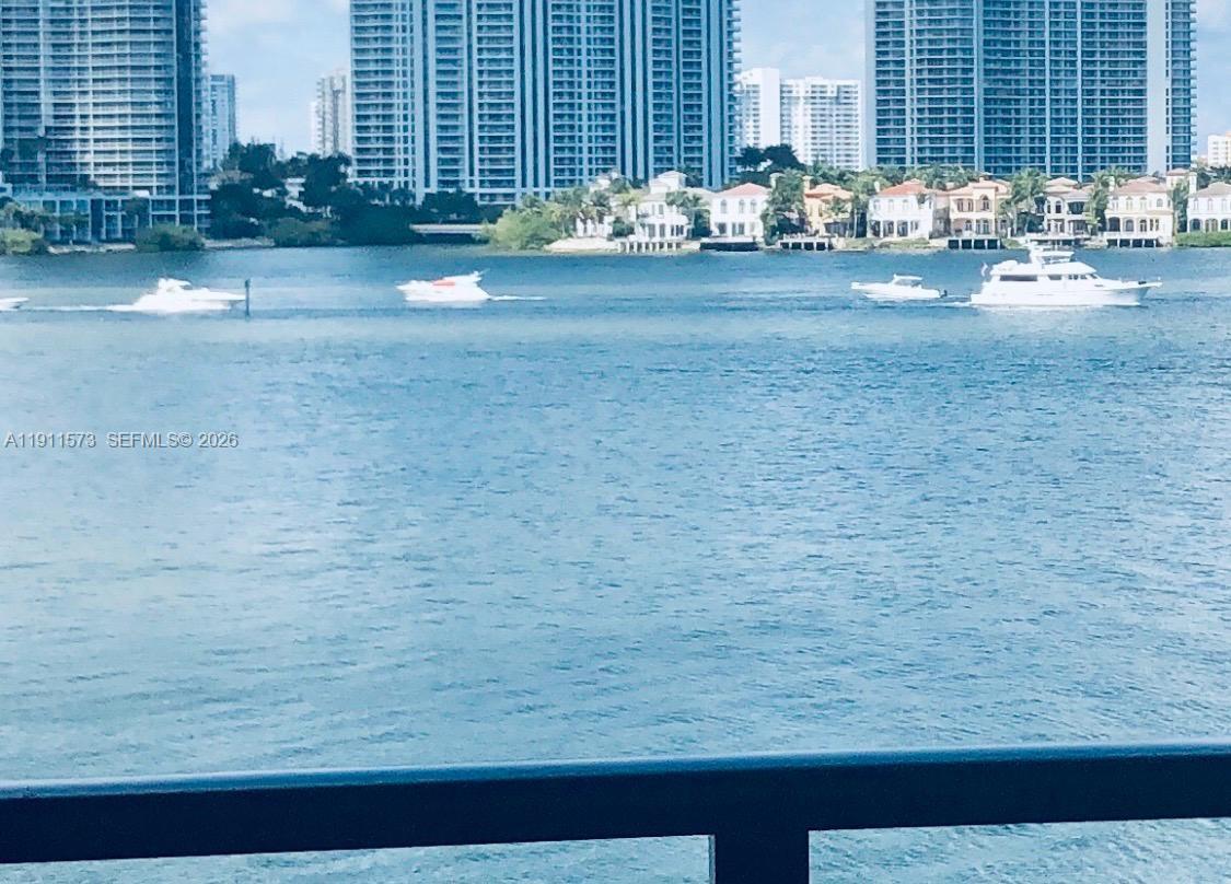 Welcome to your stunning waterfront escape in the heart of Sunny Isles Beach. This beautiful residence has been completely remodeled! It offers spectacular bay and city views, filling the home with natural light and coastal charm. Step inside to discover a bright, airy layout featuring 2 spacious bedrooms and 2 modern bathrooms, designed with both comfort and style in mind. The kitchen boasts stainless steel appliances, quartz countertops, and ample cabinetry, creating an ideal space for cooking and entertaining. The building just passed the 40-year recertification. This unit comes with one parking space and a storage unit. The windows in the living room are hurricane proof.