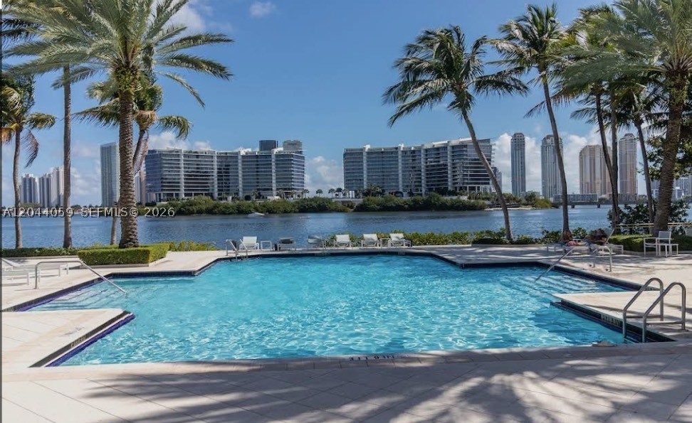 Beautifully Renovated 2-Bedroom Condo in Village by the Bay – Aventura

Welcome to this beautifully renovated 2-bedroom, 2-bathroom residence in the highly sought-after Village by the Bay, one of Aventura's most desirable gated waterfront communities. This move-in-ready home features a modern open layout, updated finishes, a stylish kitchen with contemporary cabinetry and countertops, renovated bathrooms, and elegant flooring throughout.

Enjoy resort-style living with exceptional community amenities, including two swimming pools, one overlooking the scenic canal, a relaxing BBQ and picnic area, tennis courts, fitness center, clubhouse, children's playground, and beautifully landscaped grounds.

Ideally located just minutes from Aventura Mall, Sunny Isles Beach, shopping, dining, parks, and major highways. Conveniently close to top-rated public and private schools, making this an excellent choice for families and professionals alike.

Whether you're looking for a primary residence, a vacation home, or an investment opportunity, this exceptional condo offers the perfect combination of comfort, location, and lifestyle.

Don't miss this opportunity to own a fully renovated home in one of Aventura's premier communities!