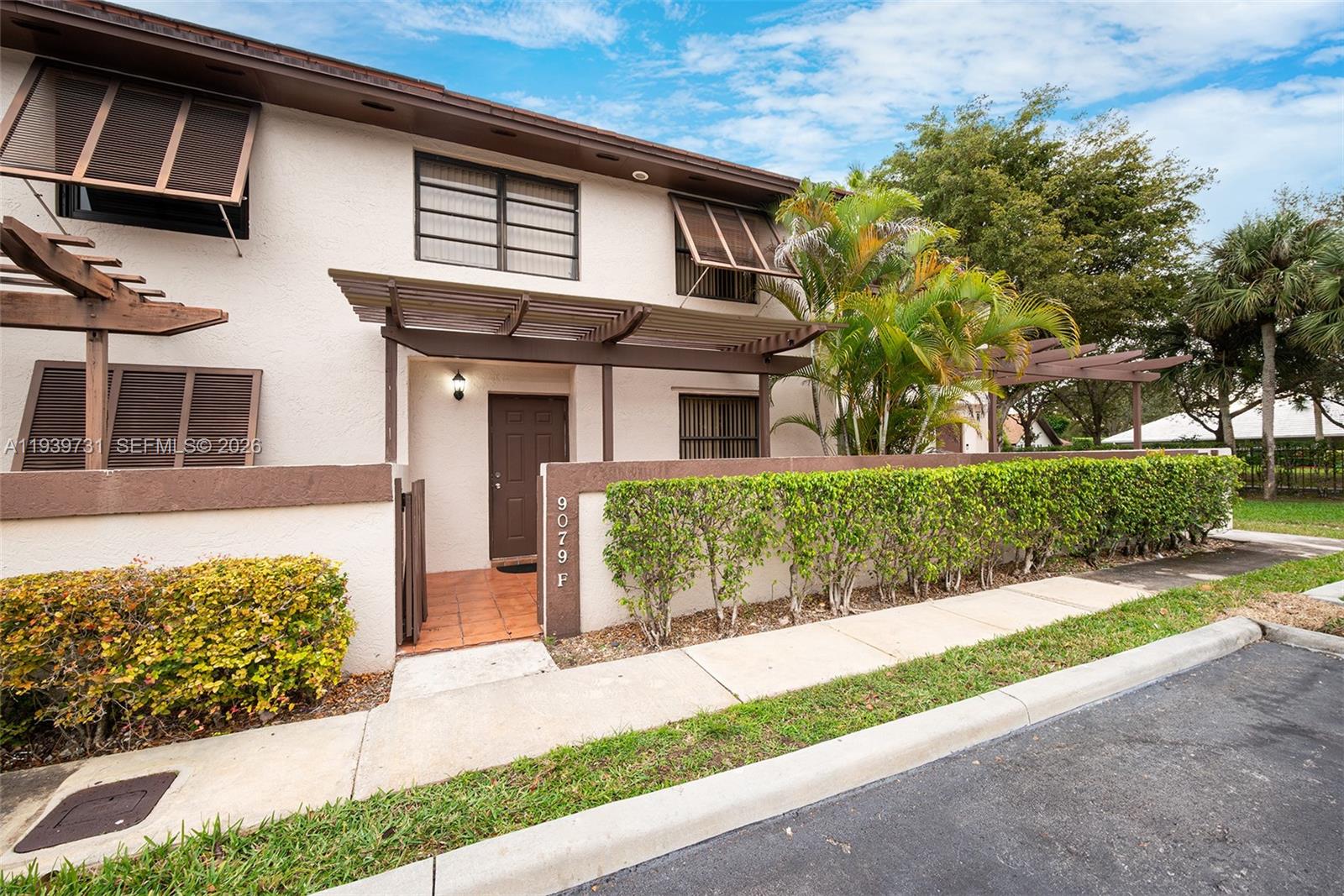Discover this inviting 3-bedroom, 2-bath townhome located in the heart of Kendall. Featuring high ceiling, open living/dining area. The home offers a spacious and sunlit living and dining area, a well-appointed kitchen with ample cabinetry, and a private, partially covered screened patio ideal for everyday enjoyment or hosting guests. One bedroom is conveniently located on the main ground floor, perfect for guests or added flexibility. Each bedroom is comfortably sized with generous closet space. Set within a peaceful, well-kept community, residents can enjoy amenities including a swimming pool, tennis courts, and walking paths. Conveniently situated near excellent schools, shopping centers, restaurants, and major highways, this property delivers both lifestyle and location.
