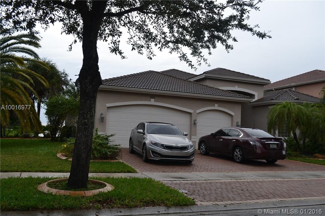 5/3 Pool home with a lake view located at the resort style community of Sunset Lakes. Community offers 24 hours security guard, pool, exercise room, club house, party room, picnic areas, play area, basket ball and tennis courts. Property is occupied and occupants are not to be disturbed or contacted under any circumstances. Interior inspections are not available.