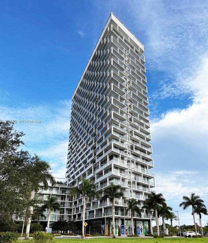 Best Price in the entire building! MAKE OFFER!!!  Seller Motivated!!!! Welcome to this beautiful and modern 2-bedroom, 2-bathroom condominium located in the prestigious Metropica community. This spacious residence features a bright and open living area, complemented by a large private terrace—perfect for relaxing or entertaining. The upgraded kitchen is equipped with stainless steel appliances, including a microwave, oven, dishwasher, and a full-size washer and dryer for your convenience. High-impact windows provide safety, energy efficiency, and abundant natural light throughout the unit. Ideally situated just minutes from Sawgrass Mills Mall—the largest outlet and value retail shopping destination in Broward County—this property is also close to top dining, entertainment, and major highways. Enjoy proximity to the Amerant Bank Arena, home of the Fl Panthers
