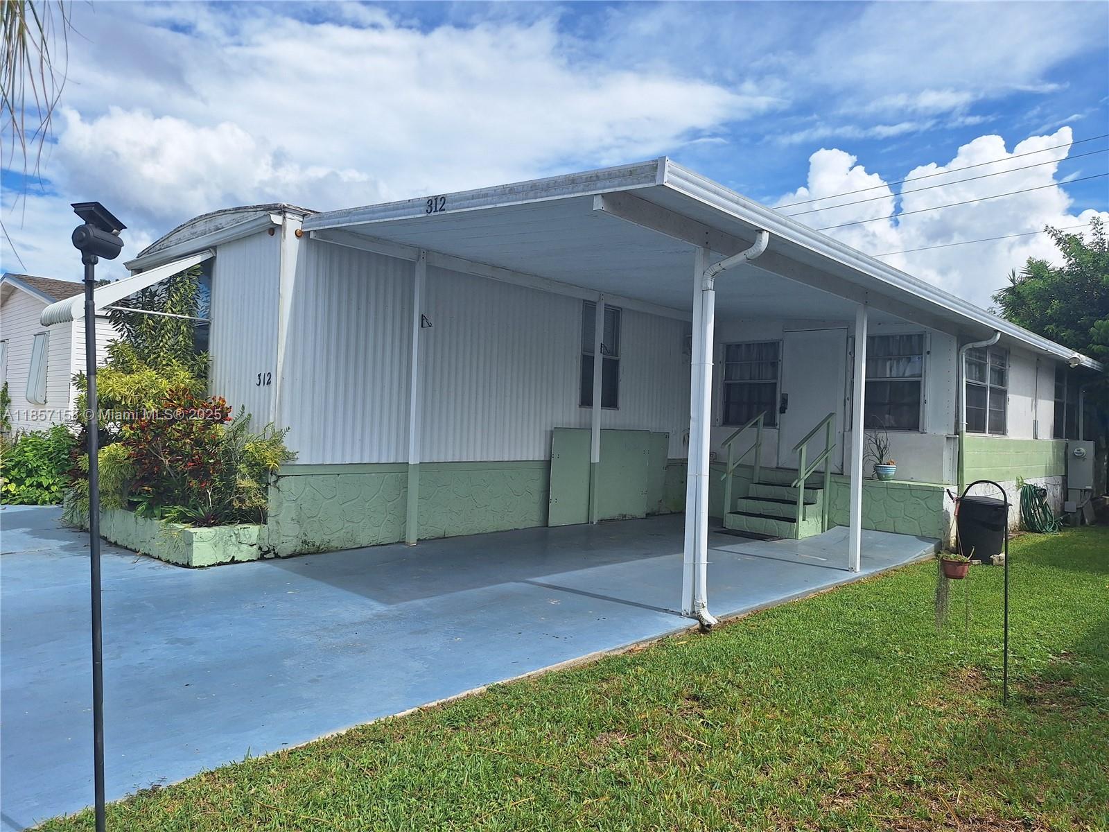 DON'T MISS THIS GREAT BUYING OPPORTUNITY, A SINGLE WIDE MANUFACTURED HOME IN A 55 PLUS ADULT COMMUNITY, INCLUDES THE LAND. THIS MODEL OFFERS A SPLIT  PLAN WITH 3 BEDROOMS AND 1 FULL BATHROOM. CARPET AND VINYL FLOORS THROUGHOUT, INCLUDES  WASHER AND DRYER, OPEN DECK WITH A RETRACTABLE REMOTE CONTROL ELECTRIC OVERHANG FOR OPENING AND CLOSING, STORAGE SHED, ATTACHED CARPORT FOR 2-3 CARS.  THE COMMUNITY OFFERS A CLUBHOUSE AND A HEATED POOL THE ENTIRE YEAR, NEW GYM. THIS IS A PET FRIENDLY COMMUNITY. LOW MONTHLY HOA. EXCELLENT CENTRAL LOCATION,
 NEARBY MAIN ROAD SOUTH DIXIE HWY, MINUTES AWAY FROM THE FLORIDA TURNPIKE, THE FLORIDA KEYS, SHOPPING CENTERS,  HOSPITAL, AND MUCH MORE....