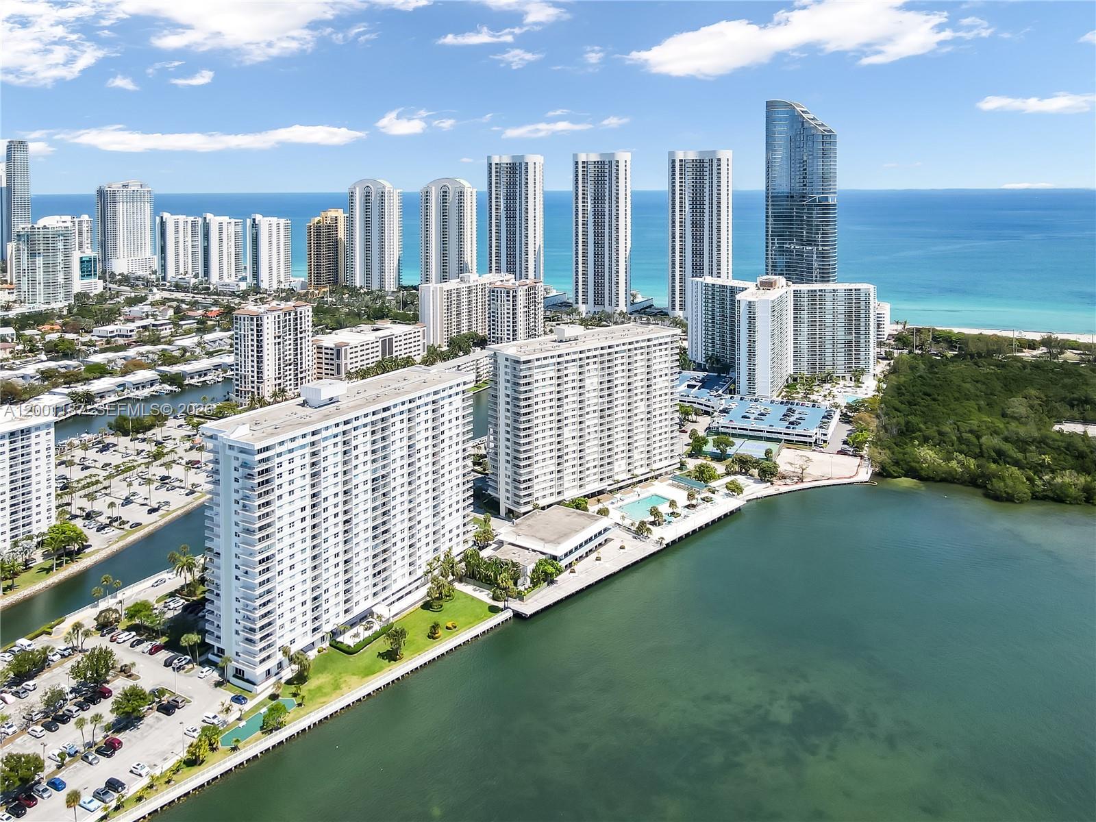 The Ultimate Location for Sun, Sand & Sea. Discover The Arlen House, a Premier Secured Intracoastal & Boating Community in Southernmost Sunny Isles Beach. This stunning 3rd-floor corner unit offers a bright, panoramic waterfront lifestyle directly across from the beach & the Ritz-Carlton Residences. The Perfect Blend of Comfort & Convenience. Enjoy Effortless 3rd Fl Access (ideal for Shabbat). Brilliant, Natural Light thru-out. Entertain in Style in the Sizeable Living Space & Expansive Wrap-around Balcony. ALL-NEW Gourmet Eat-in Kitchen featuring Ample Quartz Counters, Cabinets, Under-cabinet Lighting & SS Appliances. New Central Air! 2 NEW Full Baths w/ Quartz Vanities & Stonework. 2nd bath w/Walk-in Shower; Primary Bath w/Bathtub, both w/sliding Shower Doors. King-sized Primary Bedroom w/2 Walk-in Closets & Sitting Area; Queen-sized 2nd bedroom w/Walk-in Closet. Closets galore thru-out!  Includes 1 Covered Assigned Parking & Floor-to-Ceiling Storage Unit. Delivered Furnished or Unfurnished! Resort-style amenities feature a Luxurious Intracoastal Heated Pool, Spa, Gym, Tennis Courts, Pickleball, Restaurant Space, Auditorium, Library, Card Rm, Billiard Room & Lush Walking Path. Gated FOB Entry w/Gate & Front Desk Security 24/7. Onsite Mngmt. Hair Salon. Mini-Mart. Partake in Community Events, Activities & Gatherings. Enjoy a secured, vibrant community just steps from the ocean. Designed for Sun-Seekers, Beach-goers & Boaters alike. Your Beachside Dream Awaits! Welcome Home!