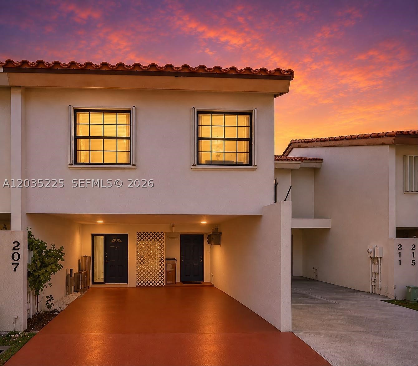 Beautiful lakefront townhouse! Featuring a brand-new 2026 roof, this spacious 2-bedroom, 2.5-bath home offers 1,718 sq ft of living area and an exceptional combination of comfort, functionality, and waterfront living.

The updated kitchen showcases granite countertops, stainless steel appliances, and ample cabinetry. Wood-look porcelain tile flooring flows throughout the main living areas, creating a modern feel.

One of the home's most desirable features is its dual-suite floor plan. Both oversized bedrooms function as private suites, each with its own remodeled full bathroom and generous closet space. The expansive layout offers flexibility for a home office, nursery, sitting area, or other future uses.

Relax and unwind from the large screened patio overlooking the tranquil lake and fountain, the perfect setting for morning coffee or evening entertaining. The home is equipped with hurricane protection throughout.

Additional features include a 2-car attached carport, covered parking, storage, a whole-home saltwater water filtration system, and a separate under-sink drinking water filtration system.

Coquina Lakes is a well-maintained, pet-friendly community offering a community pool, tennis courts, pickleball courts.

Ideally located near shopping, dining, parks, major highways, and South Florida's beautiful beaches. Move-in ready and a rare opportunity to own a lakefront cul-de-sac home in one of Deerfield Beach's most desirable communities.