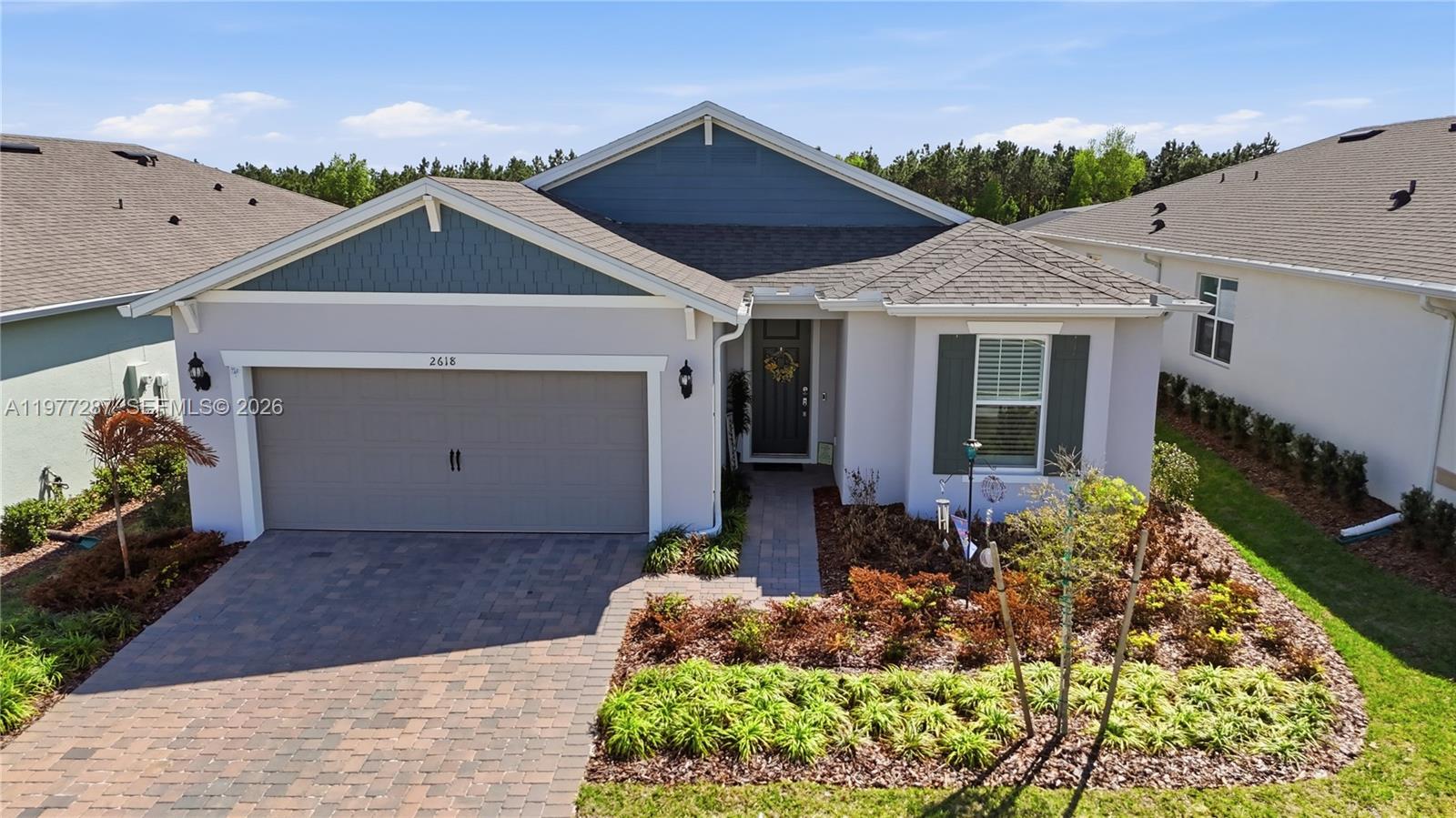 Must see home located in the rolling hills of Minneola…This home is loaded with builder and owner upgrades: upgraded configuration in the kitchen, primary bathroom, and laundry room, zero edge corner sliding doors, extended covered lanai, kitchen and bathroom cabinets, counter tops, kitchen backsplash, pre-wired for pendent lights, recessed lighting, and much more…Premium lot with no rear neighbors...The unique floor plan allows you the opportunity to convert the flex room to a 3rd bedroom and it has a 3 car tandem garage...This home has features the builder can no longer offer, irrigation system in the rear of the home and the AC compressor is on the side of the home…New construction homes the AC compressor is right outside the primary bedroom window...Community features: Manned gate, tennis & pickleball courts, community garden, clubhouse, zero entry pool with lap pool, fitness center & movement room, bar & grill with indoor/outdoor seating , dedicated lifestyle director, and so much more…The new clubhouse is scheduled to open early spring 2026…The community will be less than 1 mile from the new “Hills City Center” featuring the Crooked Can Brewery and Food Hall and it is less than 2 miles from the Florida Turnpike…