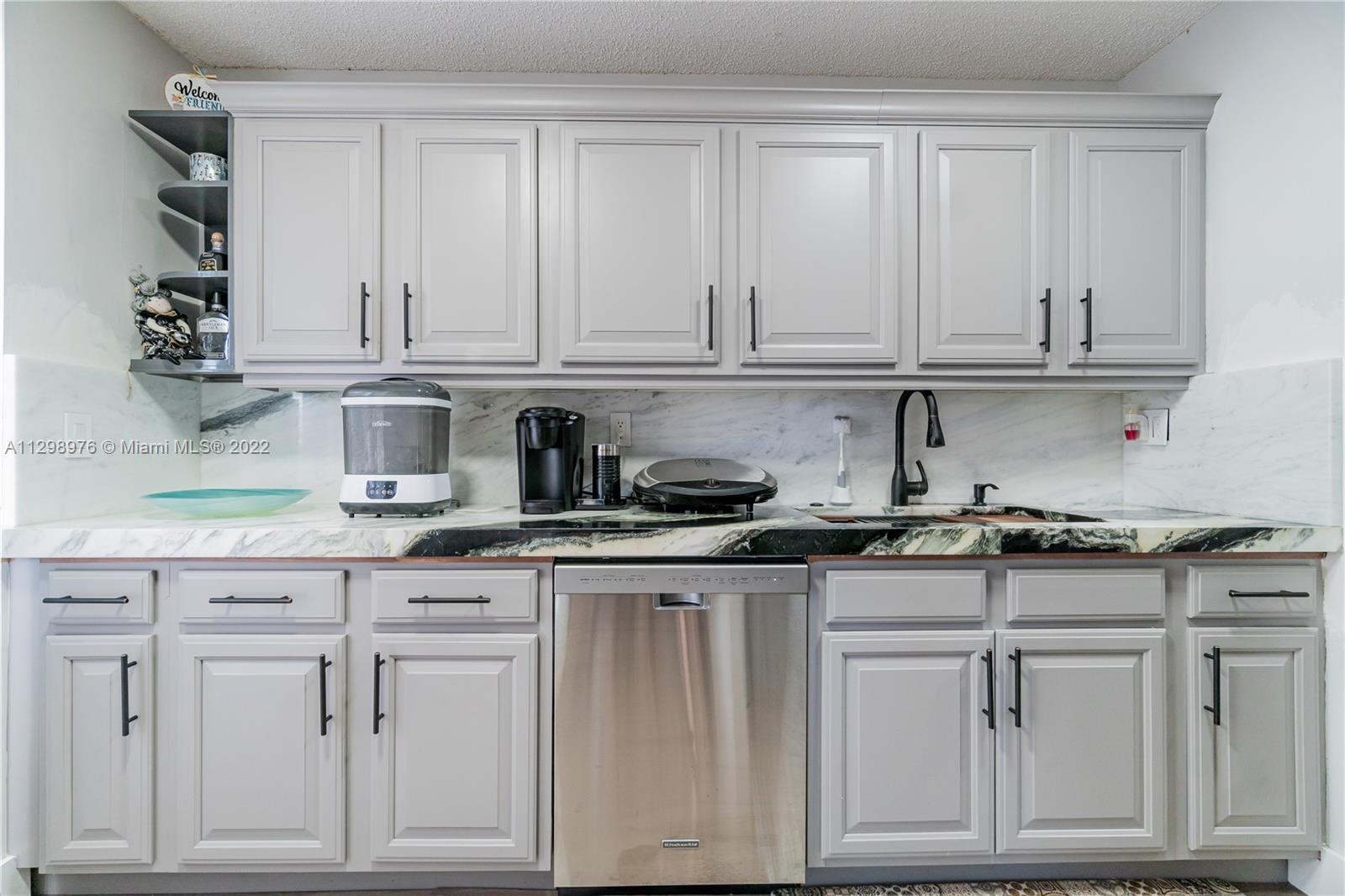 Location, location... this very beautiful and well maintained community is close to all major HWYS, parks, shopping malls, restaurants, beautiful beaches and much more. The renewed unit, with 1/1 plus den and 1/2 bath offers a gorgeous kitchen with new stainless steal appliances, brand new full size washer and dryer, lots of closet space, a very cozy and private screened patio and two assigned parking spaces plus lots of guest parking. The condominium offers, a fully equipped gym, tennis court, pool, and club house. Don’t miss out on the opportunity to check out this gem!
