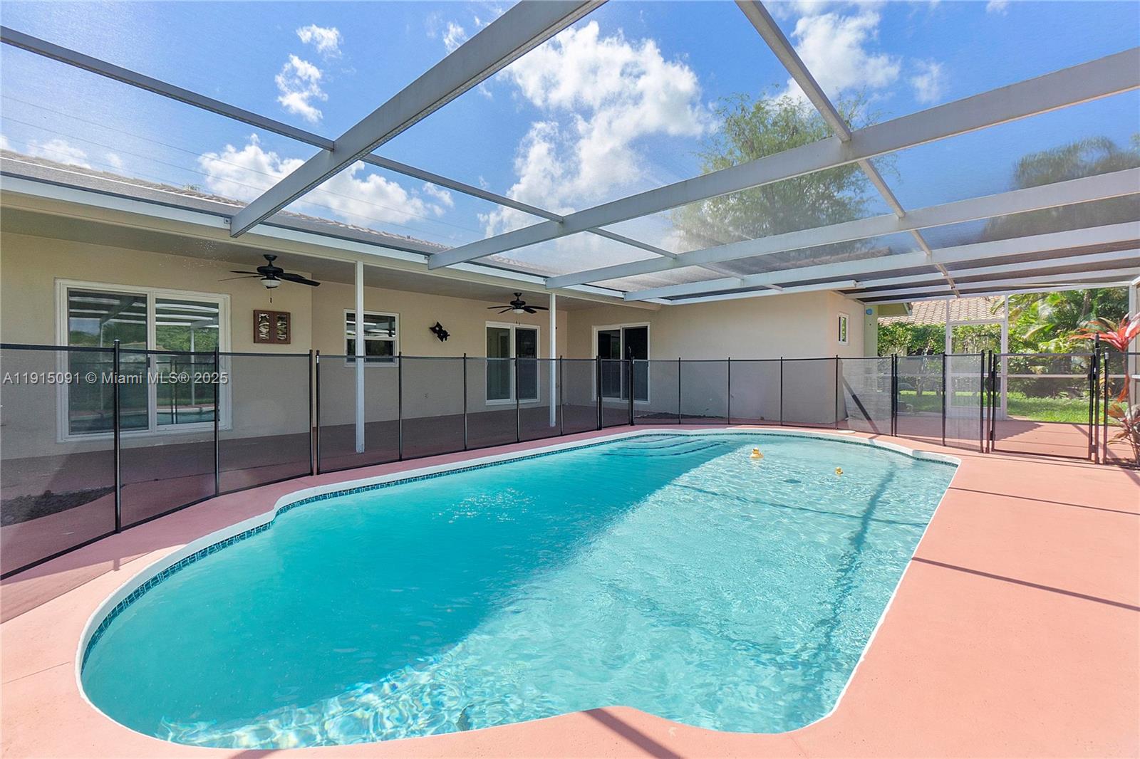 Completely remodeled Kitchen w/White Cabinets and Stainless Steel Appliances. Bathrooms also remodeled. Updated Ceramic Tile in Living areas and Wood in Bedrooms. Top of the Line Impact glass and doors. Screened Pool with Kiddie fence. Close to schools and shopping. Located on Oversized canal front Lot. TURN KEY HOME