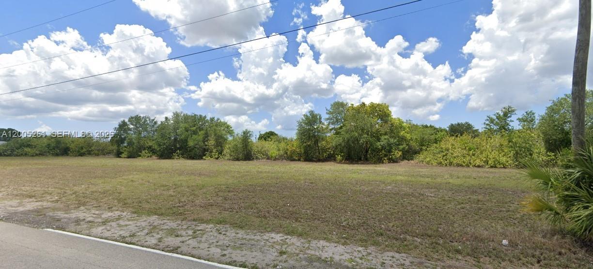 Spectacular waterfront 2 adjacent vacant lots with canal view. Build your amazing home with room for a pool. Across the street from Diplomat School. City of Cape Coral fast growing community a couple of blocks from Diplomat Pkwy E. Close proximity to shopping mall, restaurants and a short trip to Ft Myers or the beach. Municipal water and sewer.