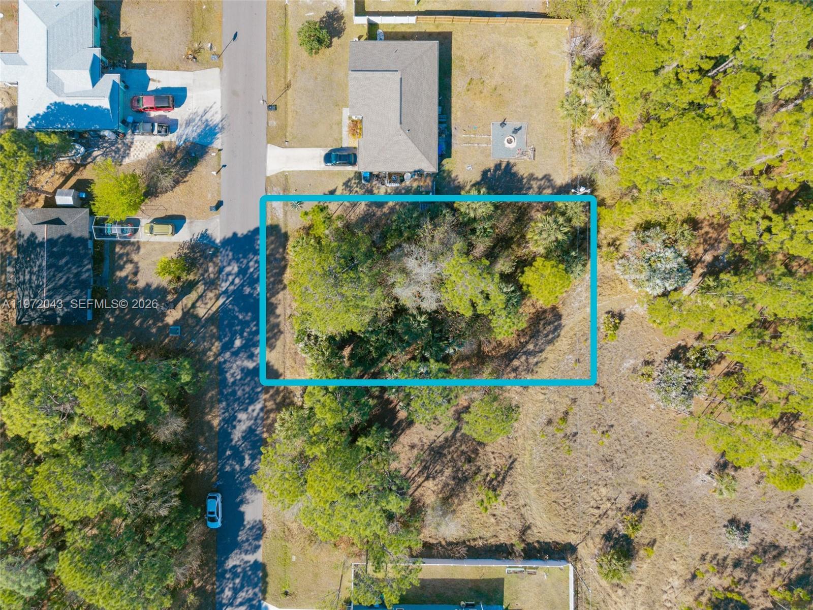 Build your dream home on this 80’ x 125’ residential lot located in desirable neighborhood. Situated in a growing area of Palm Bay, this property offers no HOA and no deed restrictions, giving you the freedom to design and build exactly what you envision. The lot is NOT serviced by city water or sewer. Well water and septic tank would have to be installed. The property is wooded, providing natural privacy, and will require tree clearing prior to building—allowing you to customize your homesite and preserve select trees if desired. Excellent opportunity for builders, investors, or anyone looking to build in Northwest Palm Bay!