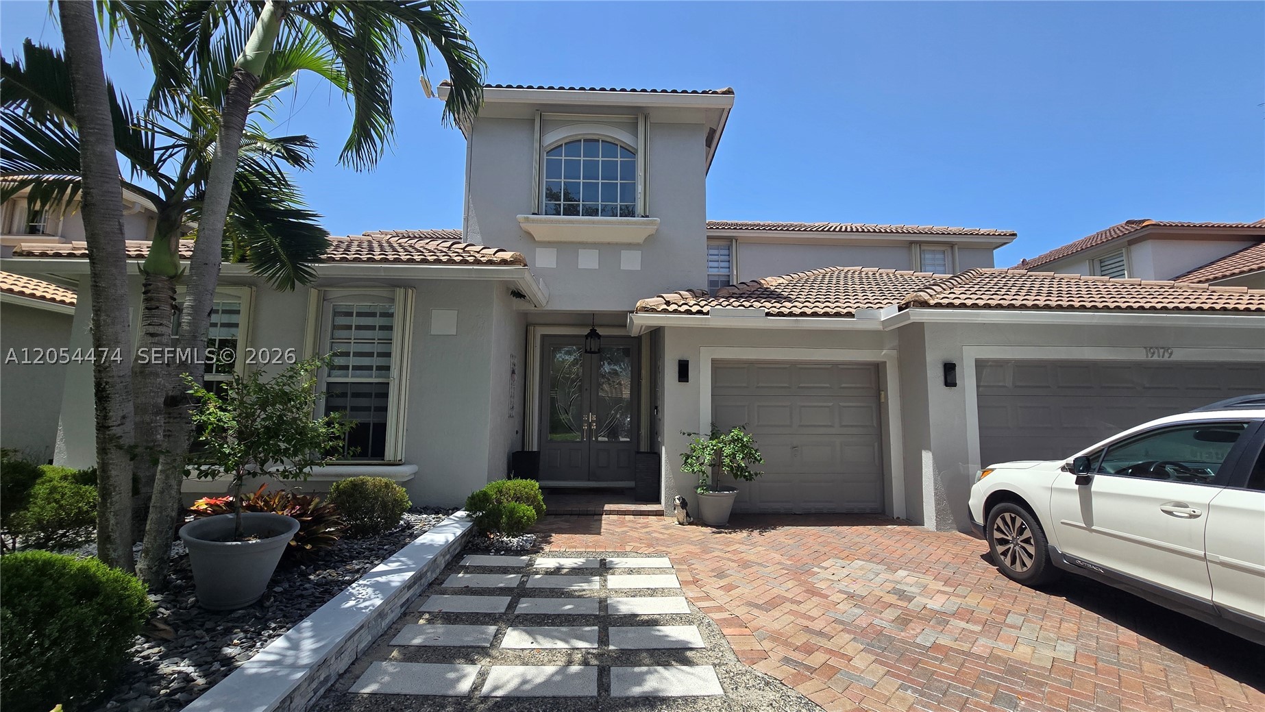 Welcome to the beautiful Gated Community of Isles at Weston! This 2 Story hosts 5 bed/4bath/3 car garage, plus ample parking space. Open concept Kitchen with SS applicances. Large Bedrooms, plenty of closet space. Office room downstairs. Beautiful Community Clubhouse, Pool, Gym, Playground, Volley and Basketball, 24hrs Security..