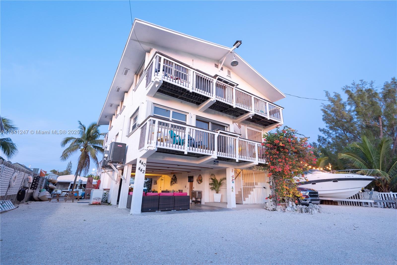 Stunning duplex on a generous 7,500 square foot lot with 75 feet of dock/sea wall. Each unit has 3 bedrooms and 2 bathrooms. Enjoy the Florida lifestyle with an above ground pool and fully fenced yard, ideal for entertaining. Short term rentals possible with the appropriate license. Live in one unit and receive rental income from the other, keep it as a duplex investment, or convert it into a single-family home facing deep water canal with no bridges. Strong rental market. Both units offer spacious layouts, ample parking, and separate utilities. The property's canal front location offers excellent access to the ocean/bay with minimal time.  Very well protected with boot key harbor. The owner is a real estate agent