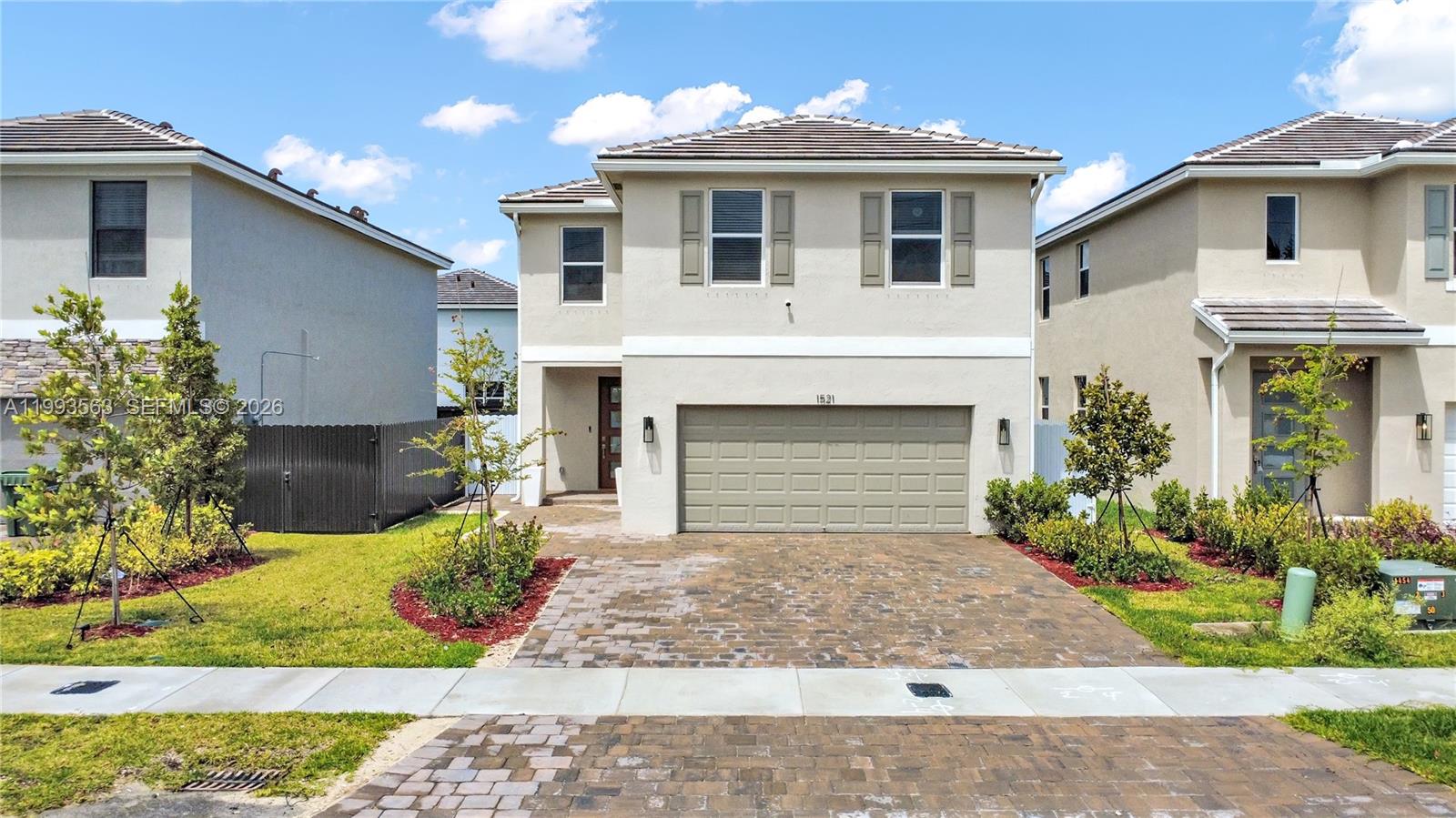 Better than new! This stunning 4-bedroom, 2.5-bath home is located in the brand-new community of Messina Place and has been thoughtfully upgraded both before and after closing. The home features high-end laminate wood flooring recently installed on the second floor, while the first floor showcases elegant ceramic tile throughout. The two-car garage has been upgraded with durable epoxy flooring and offers direct access into the home. This desirable Aisle model offers a spacious open-concept layout with a welcoming foyer that flows seamlessly into the living, dining, and kitchen areas. The modern kitchen is well-appointed with top-of-the-line stainless steel appliances, granite countertops, and a large pantry. Upstairs, you’ll find all four bedrooms, including a spacious primary suite with a large walk-in closet. The additional three bedrooms are generously sized, with one guest bedroom also featuring its own walk-in closet. A convenient half bath is located on the main level. The property is also equipped with a water treatment system, including a water softener.