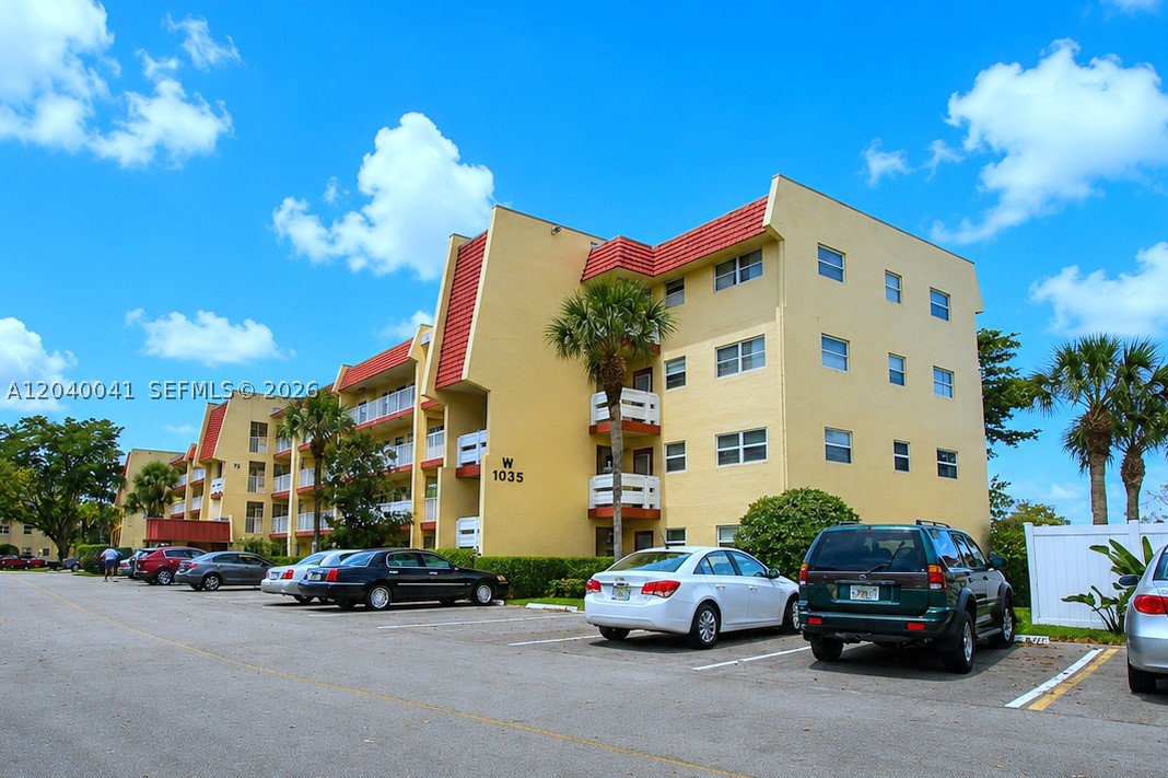 55+ Community! 40-year certification passed! GOLF COURSE FRONT CONDO LOCATED ON THE FIRST FLOOR AND PARKING SPACE RIGHT IN FRONT OF THE UNIT! Features an enclosed screened balcony. Community offers: Clubhouse, Billard room, 2 heated pools, GYM, shuffleboard, indoor pickleball, library, 4 golf ranges, and weekly social activities!