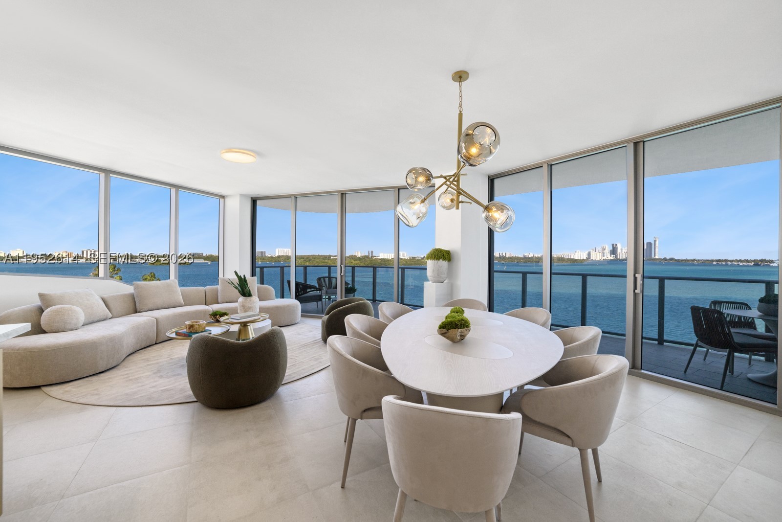Step Inside With Me! Presenting a corner residence at Onda Residences—Bay Harbor Islands’ newest construction bayfront address. Never lived in, this light-filled home is surrounded by turquoise waters at every turn. Offering 3 en-suite bedrooms, a spacious den, and expansive terraces framing open bay views. Floor-to-ceiling impact glass, a private elevator foyer, Italian porcelain flooring, and custom doors set a polished tone throughout. The Snaidero kitchen is finished with marble counters and Miele appliances, while spa-like baths feature marble finishes and Italian cabinetry. Onda Residences' outstanding amenities include a grand pool, Technogym fitness center, wellness spa, and EV charging station — plus 2 parking spaces, storage, and 24-hour valet. Moments from Bal Harbour Shops, Four Seasons Surf Club, and the beach.