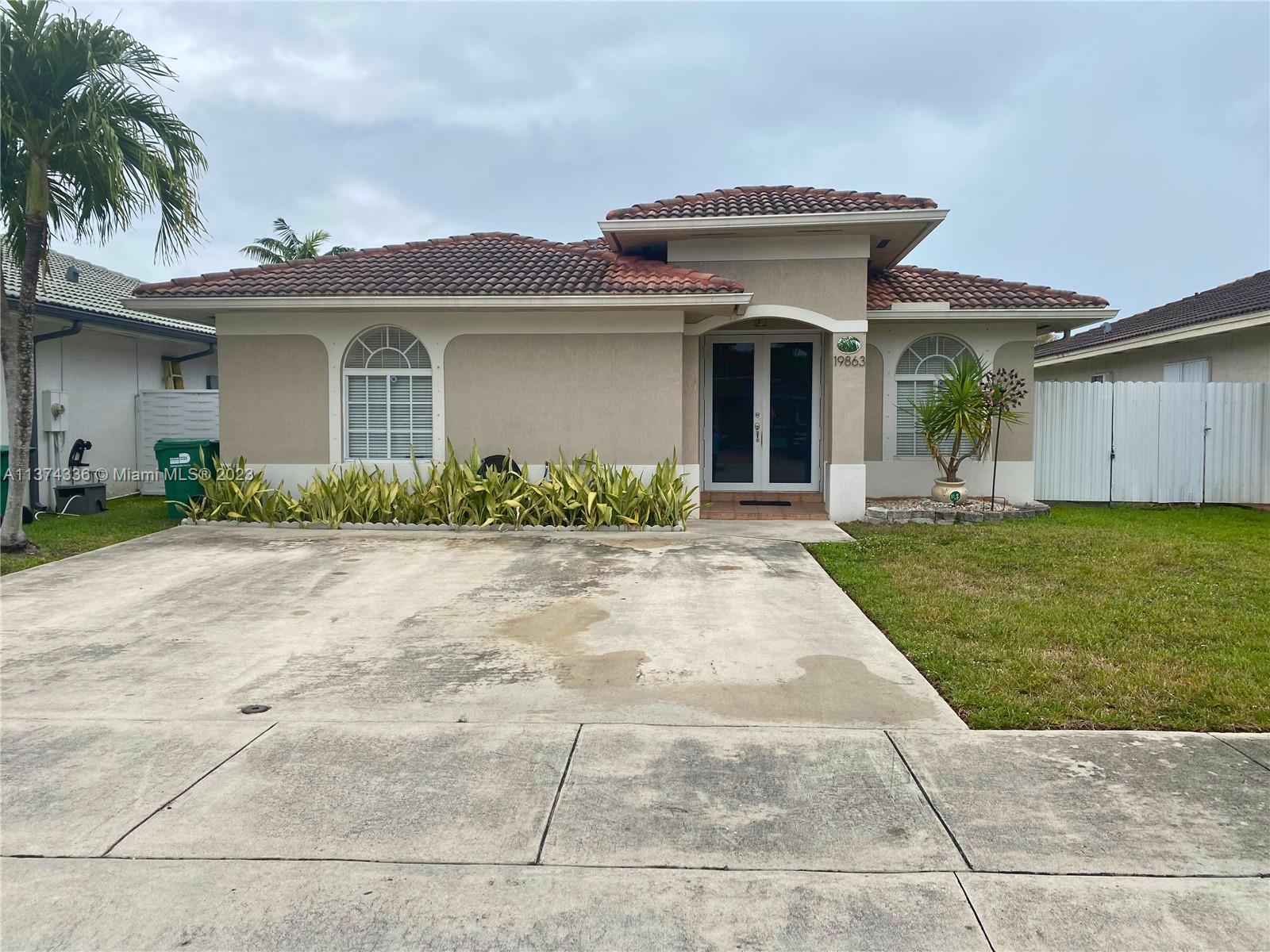 This move-in-ready 3/2 in Spanish Lakes will not last, so run before you walk. One of the most popular areas in the Miami Lakes region is here. This house has tile floors throughout, a split-bedroom layout, and an inside laundry room.  This house is very much kept up with.  What's more, be prepared to make it yours. The house has a large backyard with room for a pool and parties, a bonus storage shed, and a side yard.  Seller is very motivated!! All reasonable offers will be reviewed