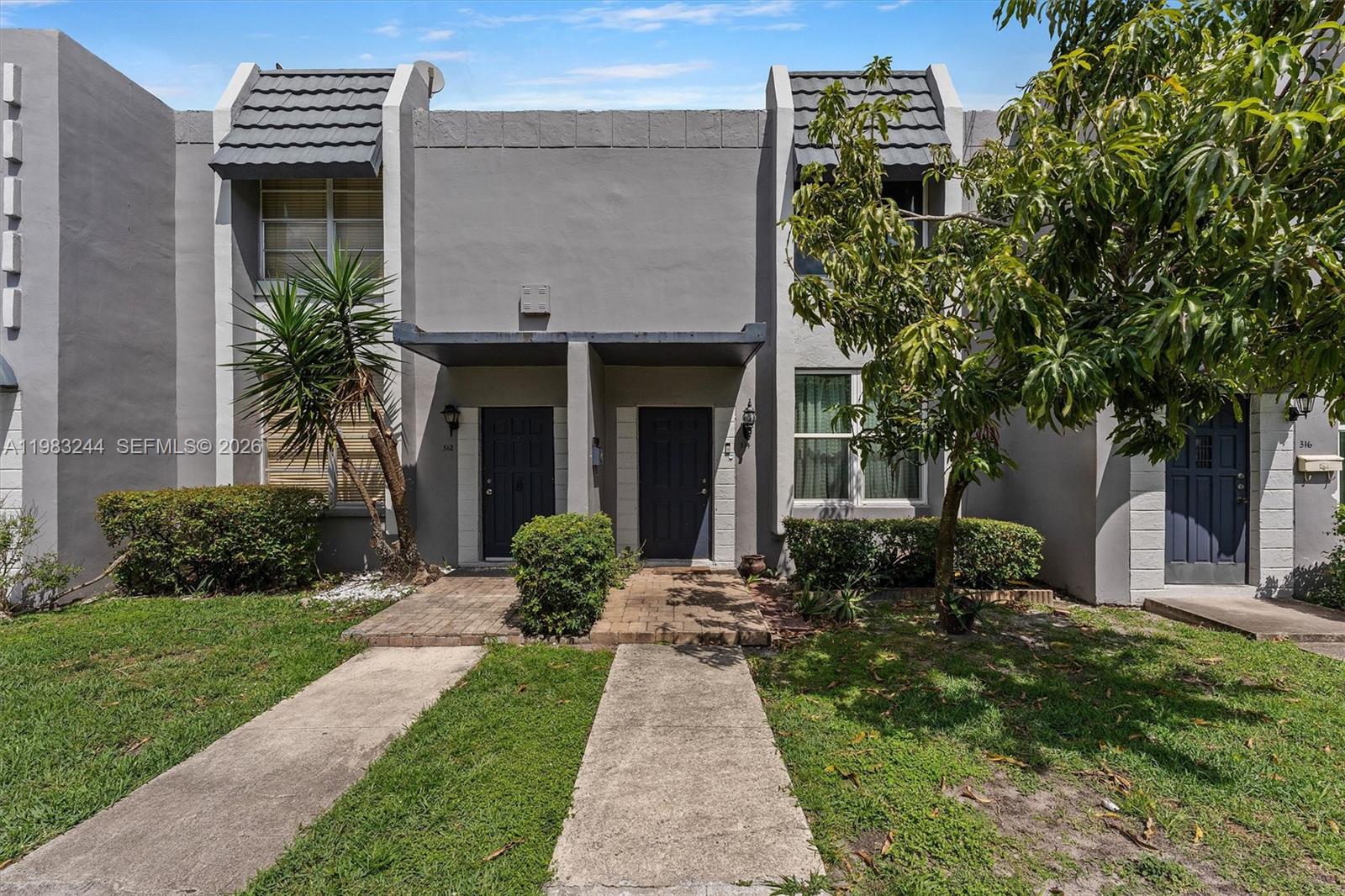 Experience the charm and elegance of this fully remodeled 2-bedroom, 2-bathroom property in the Arbour Townhouse community. Offering 1,200 sq ft of beautifully designed living space, this home features an open, bright layout with ample natural light. Enjoy the privacy of your own backyard, perfect for relaxation or hosting gatherings. The property includes an assigned parking space, guest parking, and a utility room. Conveniently located near shopping, schools, and major highways, this home is ideal for first-time buyers or investors. Please note that some images have been professionally edited through a photoshoot to highlight the property's features.
