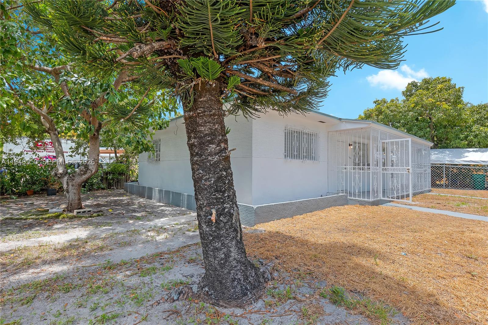 Located just one block away from Biscayne Blvd in the heart of Mimo, just steps to morningside park, buena vista, design district, minutes to wynwood, edgwater & midtown miami. A short 10-15 minute drive to Miami Beach this two unit duplex (2 bed 1 bath & 2 bed 1 bath) current income $4600 per month, has 4 parking spaces. featuring a BRAND NEW ROOF, washer dryer closet, fenced carport parking for each unit. Great investment within the booming magic city redevelopment happening.