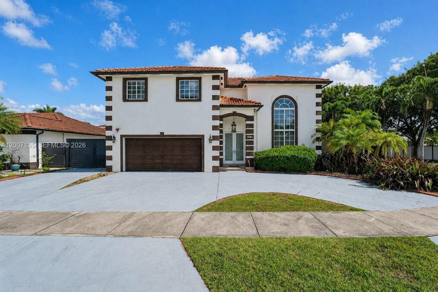 Situated on an oversized corner lot in the heart of Kendall, this beautifully renovated 4-bedroom, 3-bathroom two-story home offers the perfect blend of comfort, style, and space. The expansive lot provides exceptional privacy and room to enjoy the outdoors, while inside you’ll find formal living and dining areas, ceramic tile and laminate wood flooring, a stunning remodeled staircase with wood steps and iron railings, and a built-in surround sound system. The enormous backyard is made for entertaining, featuring an expansive pool, a charming mini golf course and plenty of space for gatherings. Additional highlights include hurricane impact doors, accordion shutters, window treatments, and two A/C units for year-round comfort, all conveniently located near top-rated Grade A schools within walking distance.