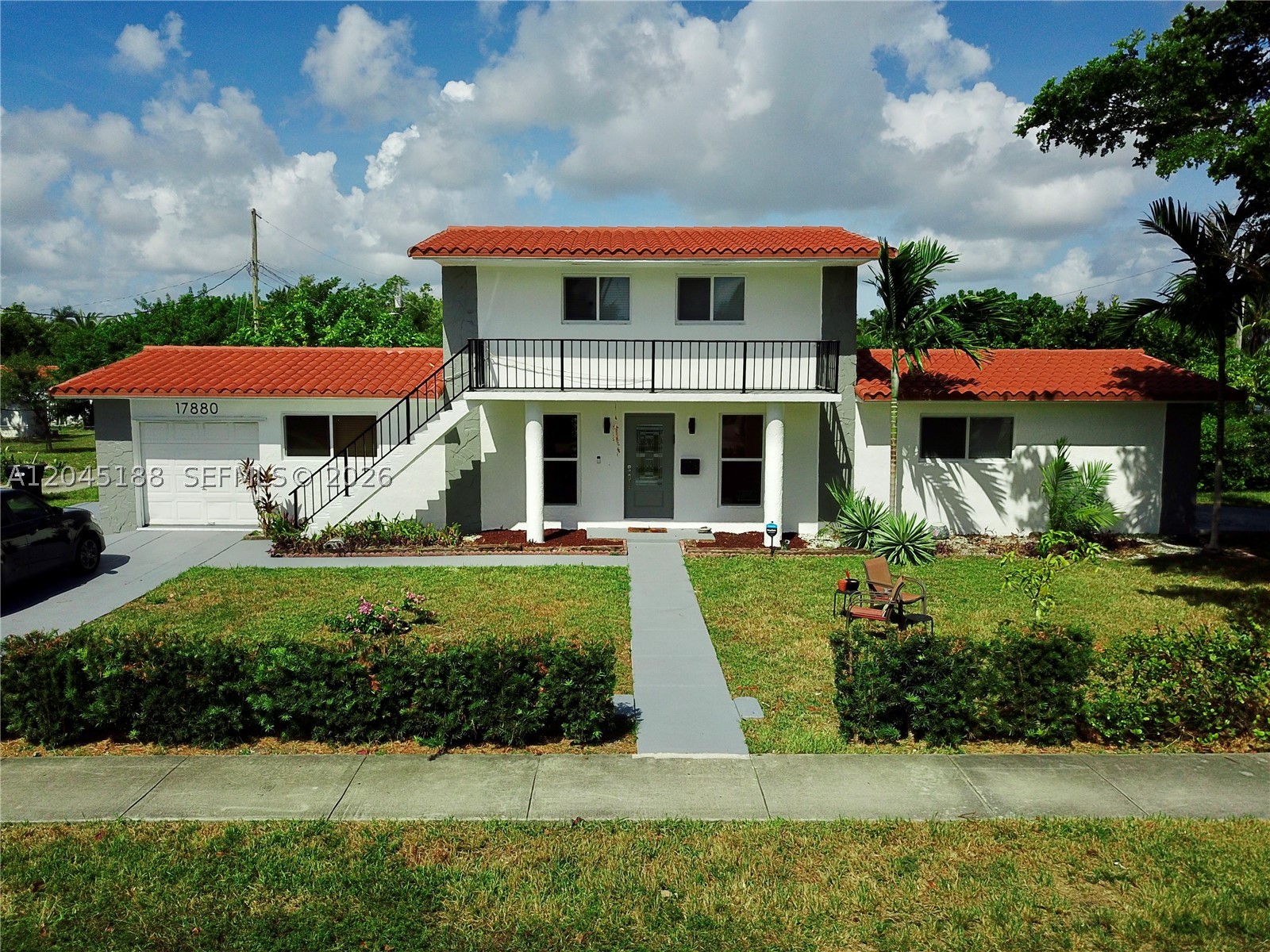 Welcome to 17880 NE 13th Avenue, a beautifully designed 3-bedroom, 2-bathroom two-story home in the heart of North Miami Beach. Offering the perfect blend of space, functionality, and Florida lifestyle, this property is ideal for families, investors, or anyone seeking a versatile home with room to grow.

The first floor features a spacious primary bedroom with a private en-suite bath, an open kitchen with dining area, a bright living room, and a laundry room. Upstairs, you'll find two generously sized bedrooms, a full bathroom, and a private balcony with charming street views.

Move-in ready, An attached covered garage offers secure parking, storage, and flexible use options.
Ideally situated just 0.1 miles from Columbia Park, featuring a scenic canal and a walking bridge connecting to S Glades Drive — perfect for morning walks and outdoor recreation. Multiple houses of worship are just minutes away, making this location as convenient as it is vibrant.

Conveniently located in North Miami Beach with easy access to major roadways, shopping, dining, and top-rated schools. Don't miss this one — schedule your private showing today!