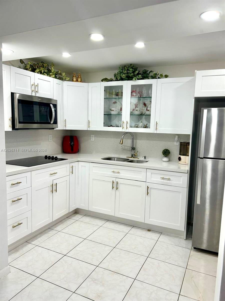 Beautifully fully remodeled 1-bedroom, 1-bath condo located in Phase 3 of the desirable Sunrise Lakes 55+ community. This move-in ready unit features ceramic flooring throughout, a modern kitchen with quartz countertops, electric cooktop, stylish zebra blinds, and stainless steel appliances. The updated bathroom offers a fresh and contemporary design.
Enjoy resort-style living with tons of amenities including a pool, billiard room, exercise room, library, courtesy bus, common laundry, and more. Perfect for retirees, seasonal residents, or out-of-state owners looking for a peaceful and active community lifestyle. Great opportunity for a first-time buyer as well! No rentals allowed. Service/emotional animals only!. Minimum credit score of 670. A 20% down payment is required for financed purchases.