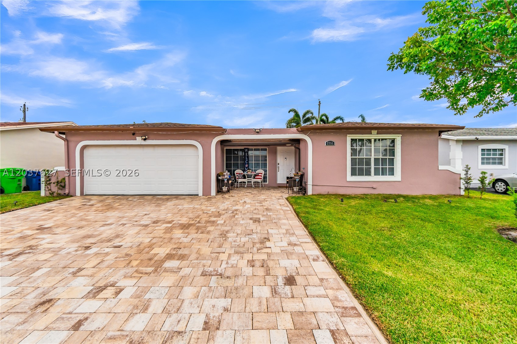 Welcome to this beautifully updated, move-in ready 3-bedroom, 2-bath home in the heart of Sunrise! Offering 1,561 square feet of living space on a 6,004 sq ft lot, this well-maintained residence has been lovingly cared for by the same owner for over 20 years. Step inside to discover spacious living areas with tile flooring throughout, freshly painted interior, and an updated kitchen featuring wood cabinetry, granite countertops, and  stainless steel appliances. The renovated bathrooms showcase modern finishes, including a frameless glass shower. Enjoy Florida living at its finest in the expansive screened pool and patio area, perfect for entertaining or relaxing year-round. Additional features include a fenced backyard, 2-car garage, paver driveway, and NO HOA. Centrally located just minutes from shopping, dining, and major highways for easy commuting. Seller will contribute $10,000 toward buyer's closing costs. Don’t miss this incredible opportunity!
