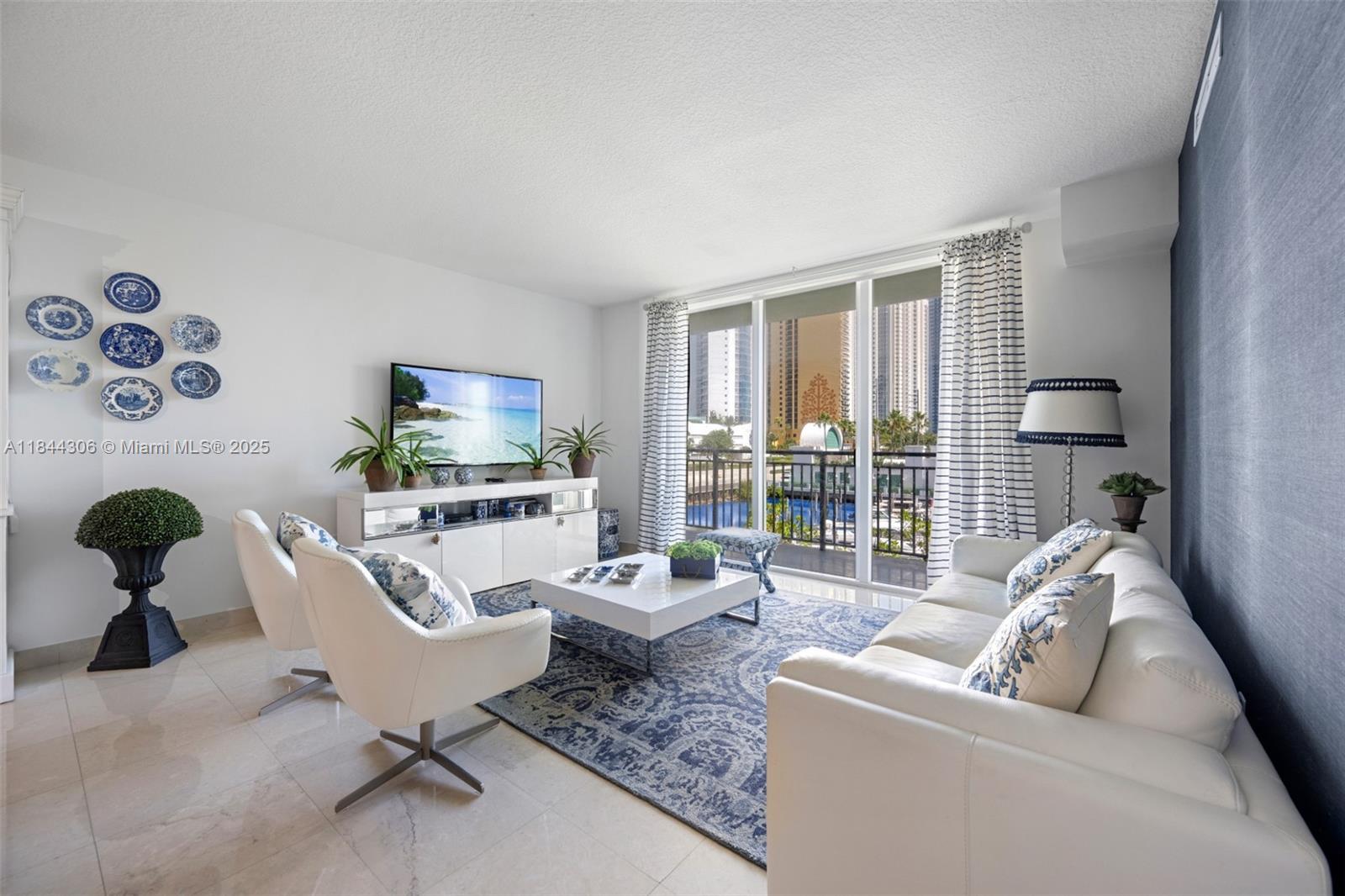 Experience elevated living in one of the largest residences at St Tropez. This finely decorated 3-bed, 2-bath unit offers 1,849 sq ft of luxurious comfort with water and city views. The open layout includes a dine-in kitchen, dedicated dining area, and spacious living space ideal for entertaining. Located in a private floor with just 3 units and same-level parking — skip the elevator — enjoy unmatched privacy and ease. Residents indulge in a Mediterranean-inspired lifestyle, starting with a spectacular lobby and a streetside promenade adorned with fountains, boutique shops, and restaurants. The building features state-of-the-art fitness club with steam rooms and saunas, pool with shady cabanas, clubhouse, Beach Club, and 24-hour valet and security services. EASY TO SHOW!