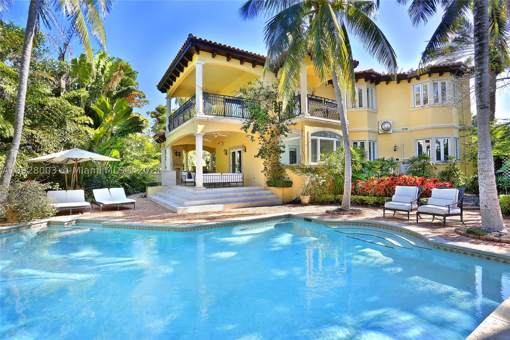 Mediterranean residence , absolutely beautiful. Built on a 16,600 sq.ft lot offering a level of privacy not easy to find. Lush landscape. Electric gates. Security system. 2 car enclosed garage. Generator, . Spectacular foyer entrance leads you to social areas. 1st floor offers bedroom en suite, Staff quarters, laundry. Beautiful kitchen w/ family room that opens to covered terraces W/ direct pool &garden view. Summer kitchen w/ TV. Pool heated/salt. Access to 2nd floor is through a grand staircase leading you to 5 bedrooms (one of them presently used as master study) master suite w/ a private office/nursery. Covered terrace, his&her custom made walk in closets. This residence offers a glamorous lifestyle. Lago Di Como feeling.