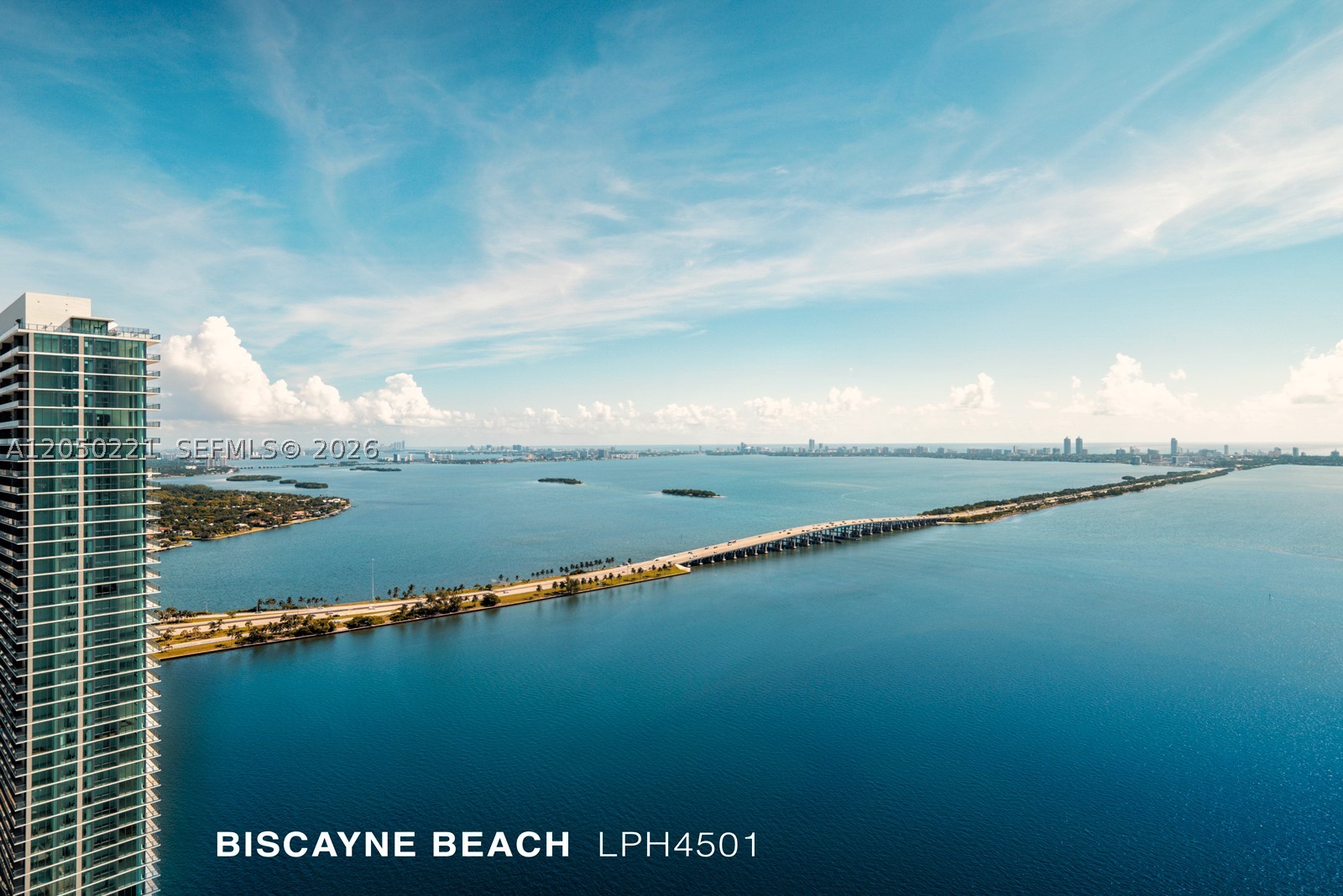 Experience elevated waterfront living in this stunning Lower Penthouse at Biscayne Beach in the heart of Edgewater. Perched on the 45th floor, this corner 2-bedroom, 2.5-bath residence offers breathtaking panoramic views of Biscayne Bay and the Miami skyline. Originally designed by renowned interior designer Thom Filicia, this home features a custom open-concept layout with the kitchen island removed, creating a significantly larger living and entertaining area. Additional features include a private elevator foyer, floor-to-ceiling impact glass, soaring ceilings, ceramic tile flooring throughout (including the expansive wraparound balcony), powered window shades, premium Miele appliances, and one assigned tandem parking space accommodating two cars. Enjoy resort-style amenities including a private Bayfront beach club, pool, fitness center, spa, valet, concierge, and 24-hour security. Ideally located just minutes from the Design District, Midtown, Wynwood, Downtown Miami, Brickell, and Miami Beach.